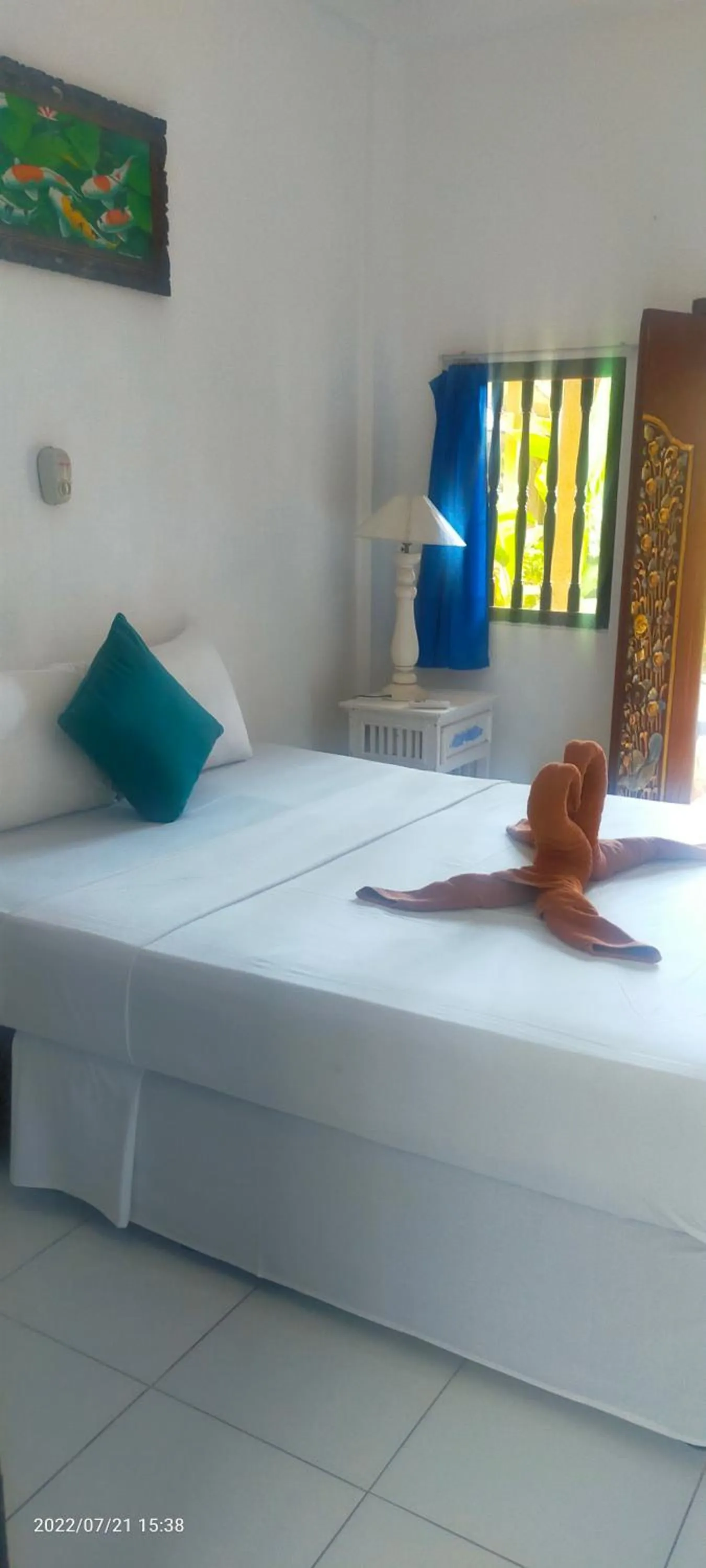 Bed in Puri Oka Beach Bungalows