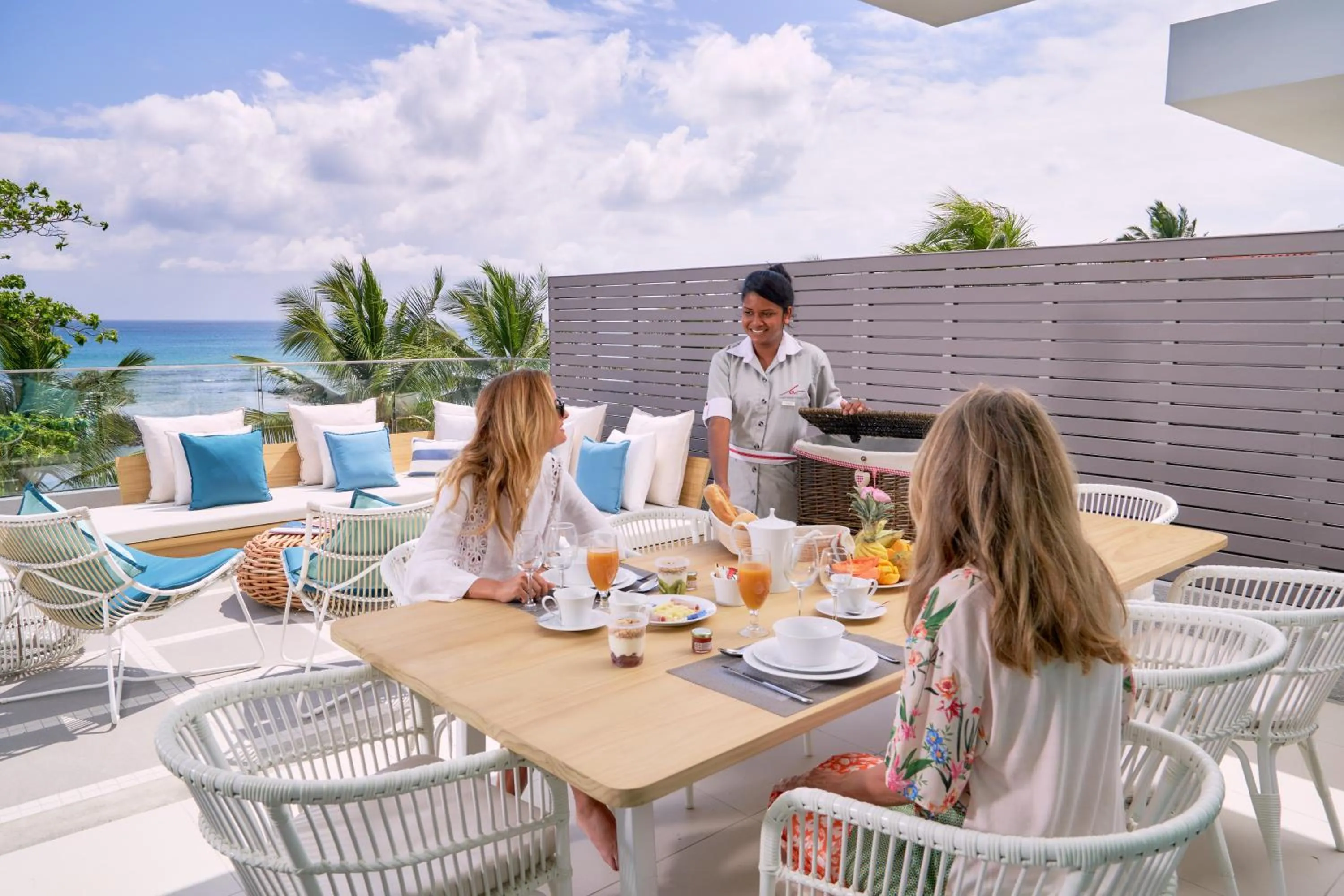 Living room in Les Estivales Beachfront Suites & Penthouses by LOV Mauritius