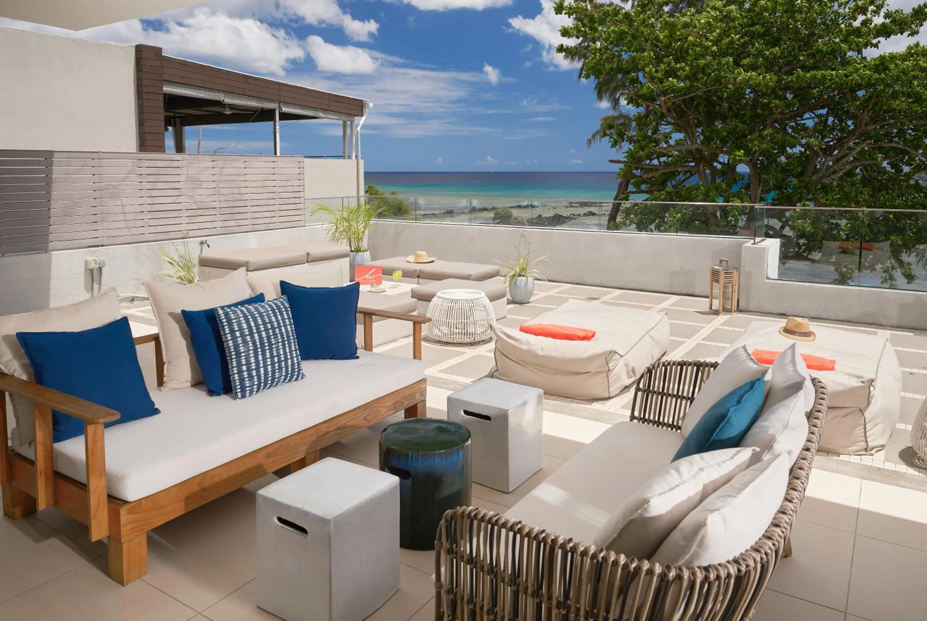 Seating area in Les Estivales Beachfront Suites & Penthouses by LOV Mauritius