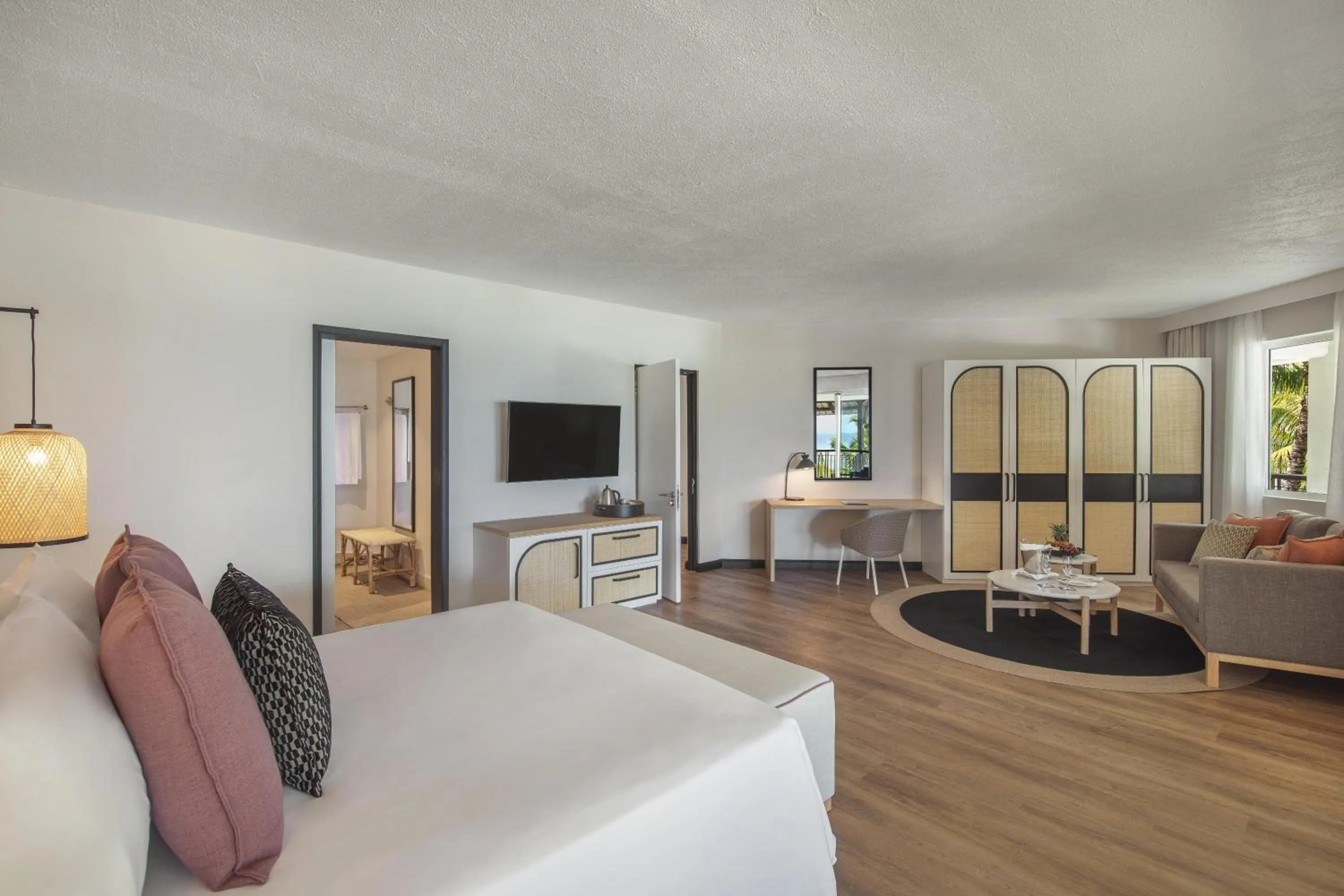 Bed in Victoria Beachcomber Resort & Spa