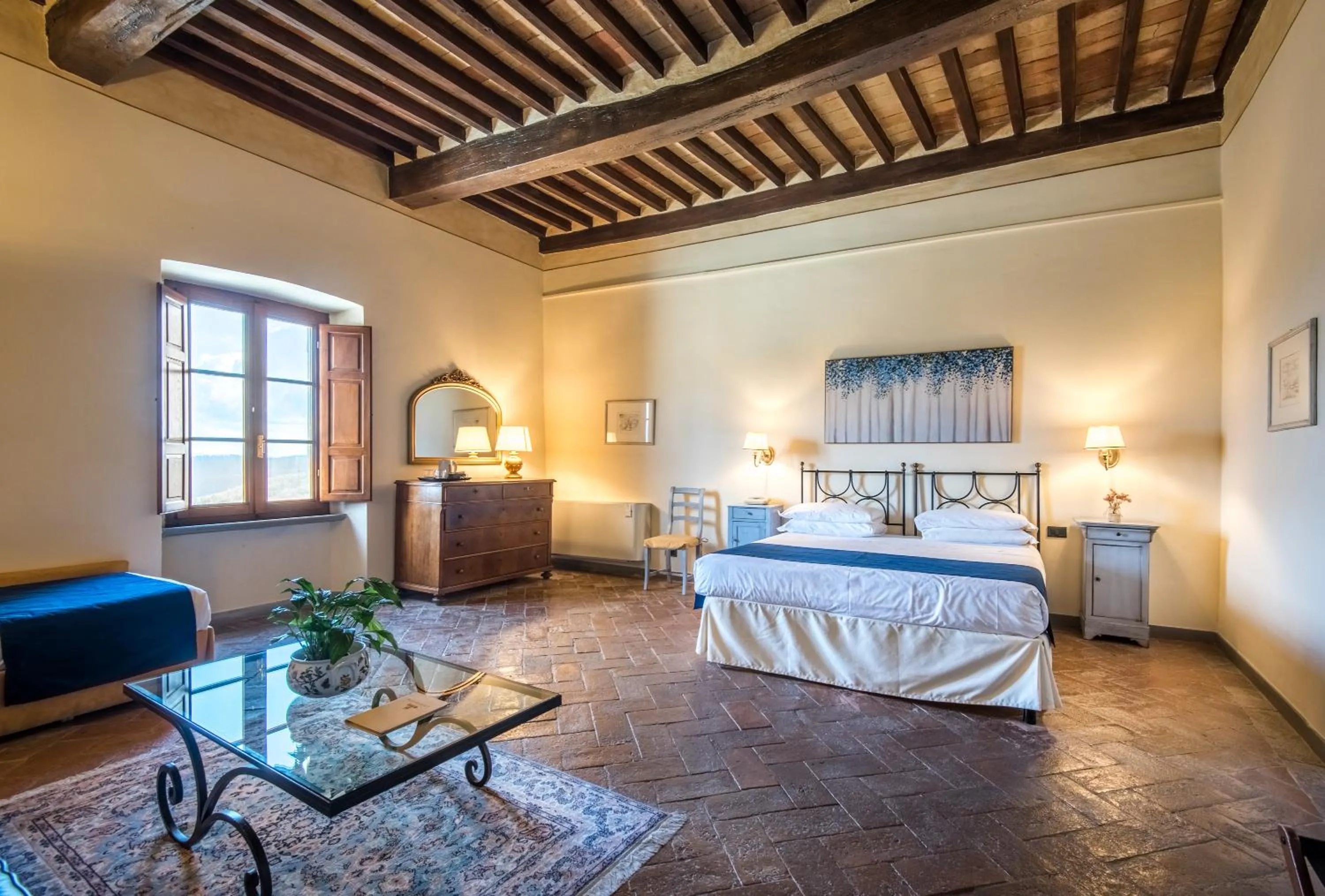 Bed in Hotel Palazzo Squarcialupi