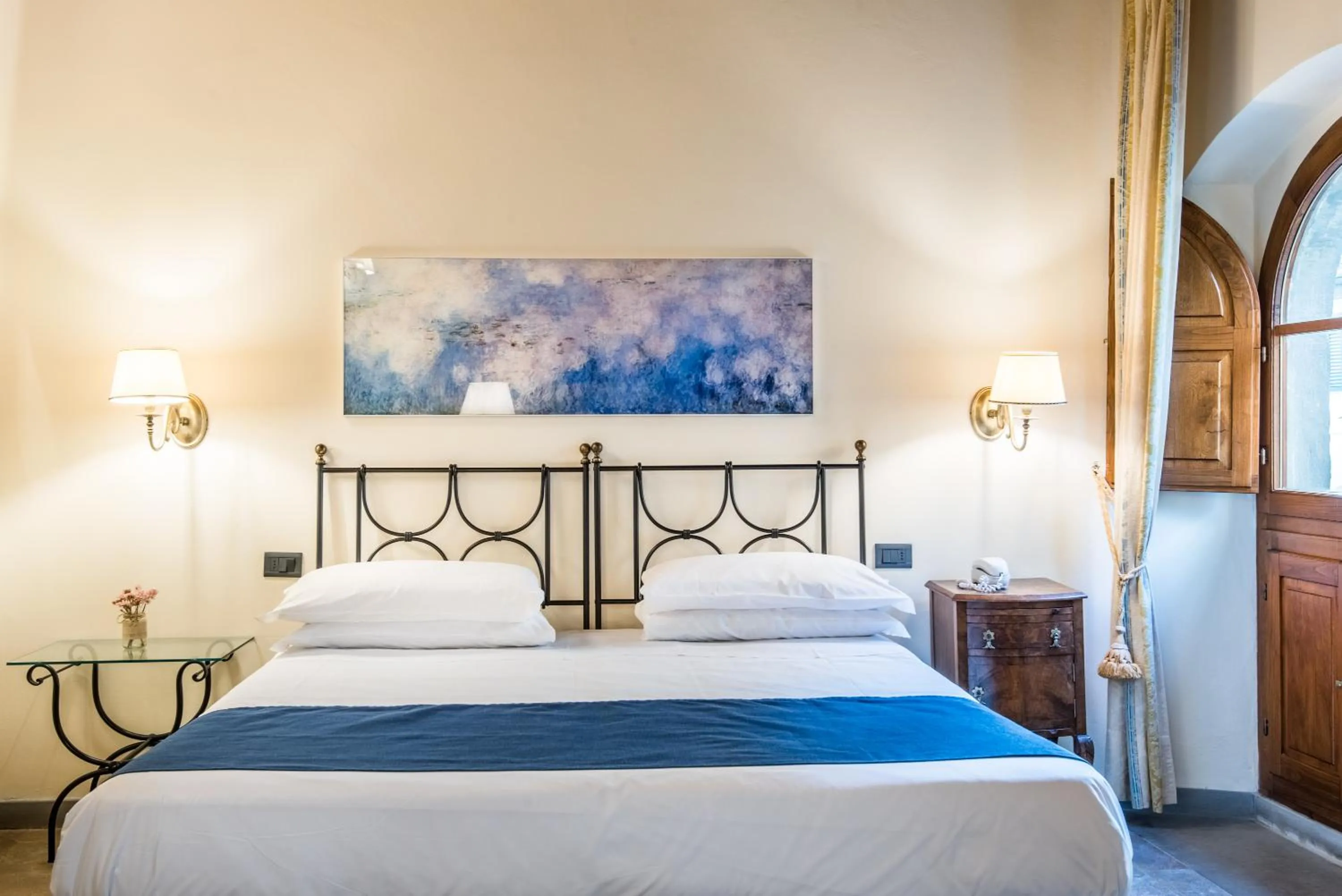 Bed in Hotel Palazzo Squarcialupi