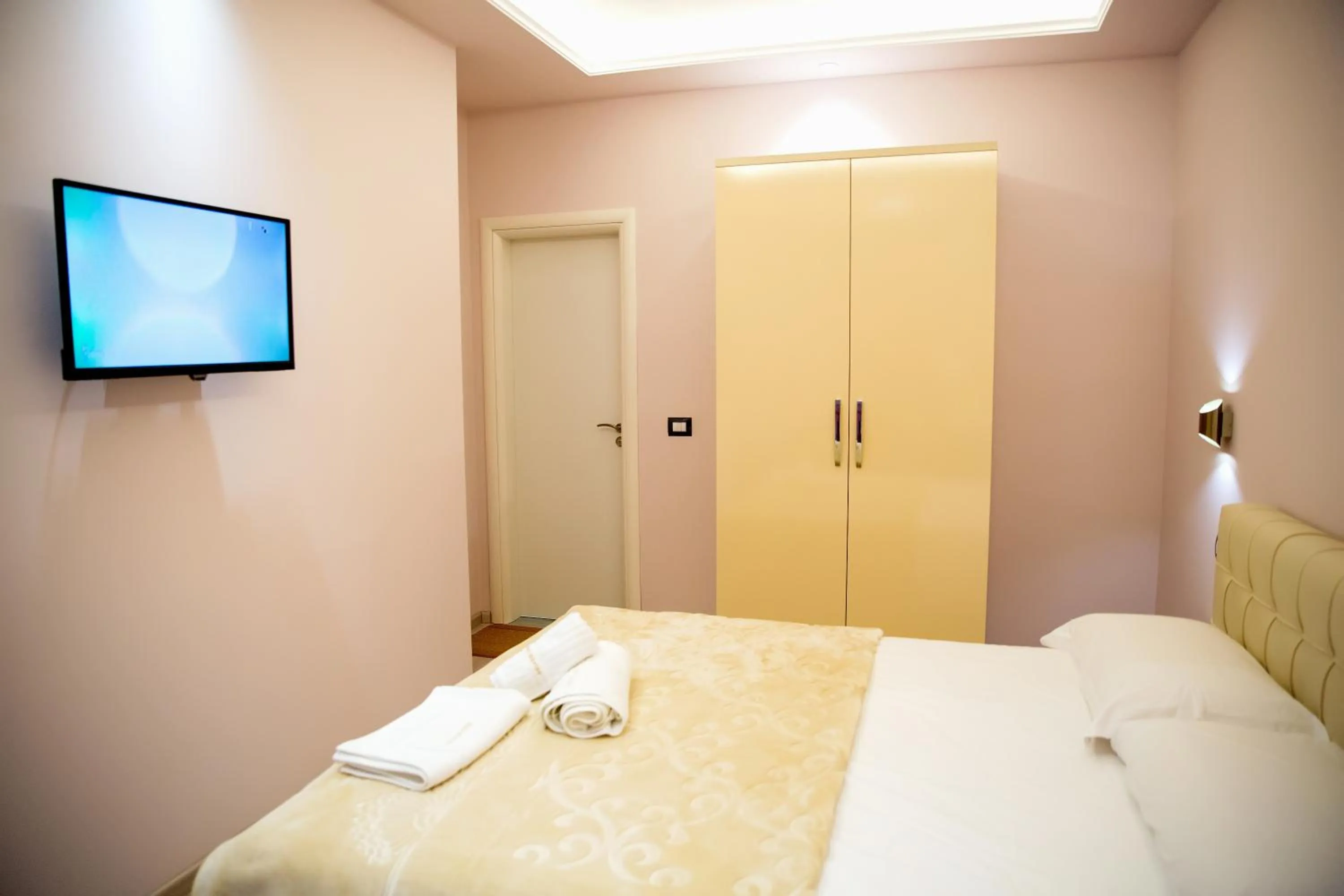 Bed in San Marino Hotel