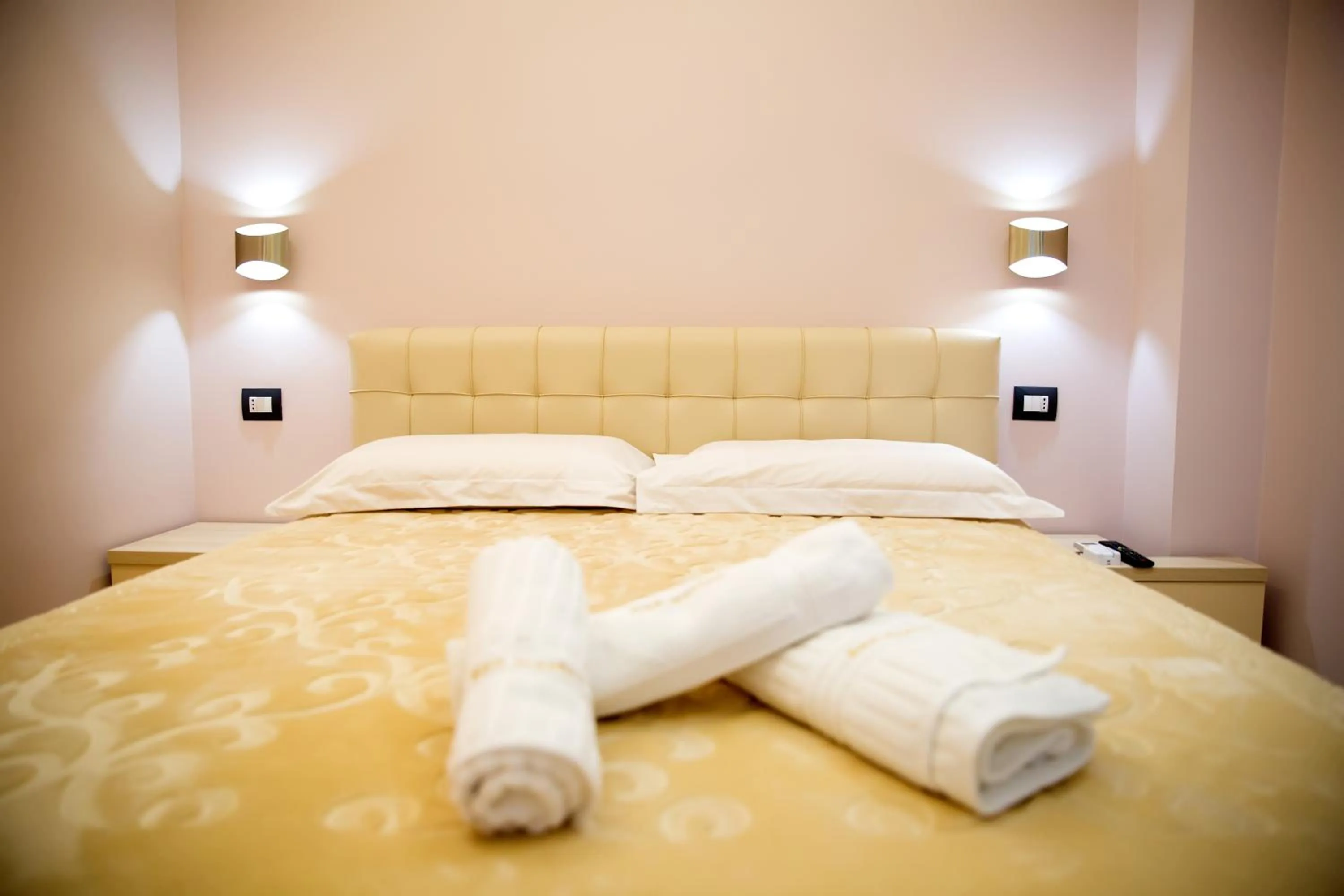 Bed in San Marino Hotel