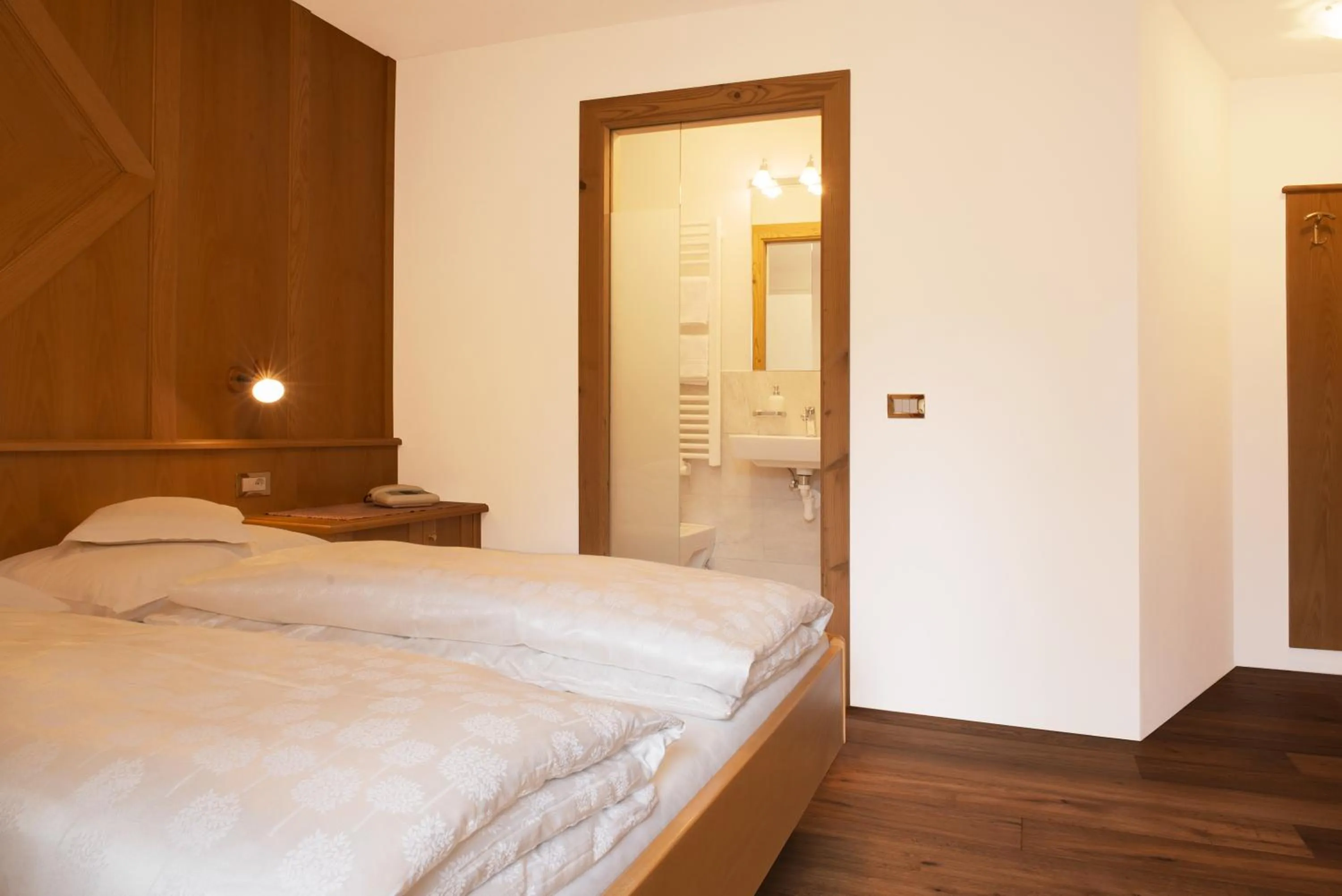 Bed in Garni Hotel Geier