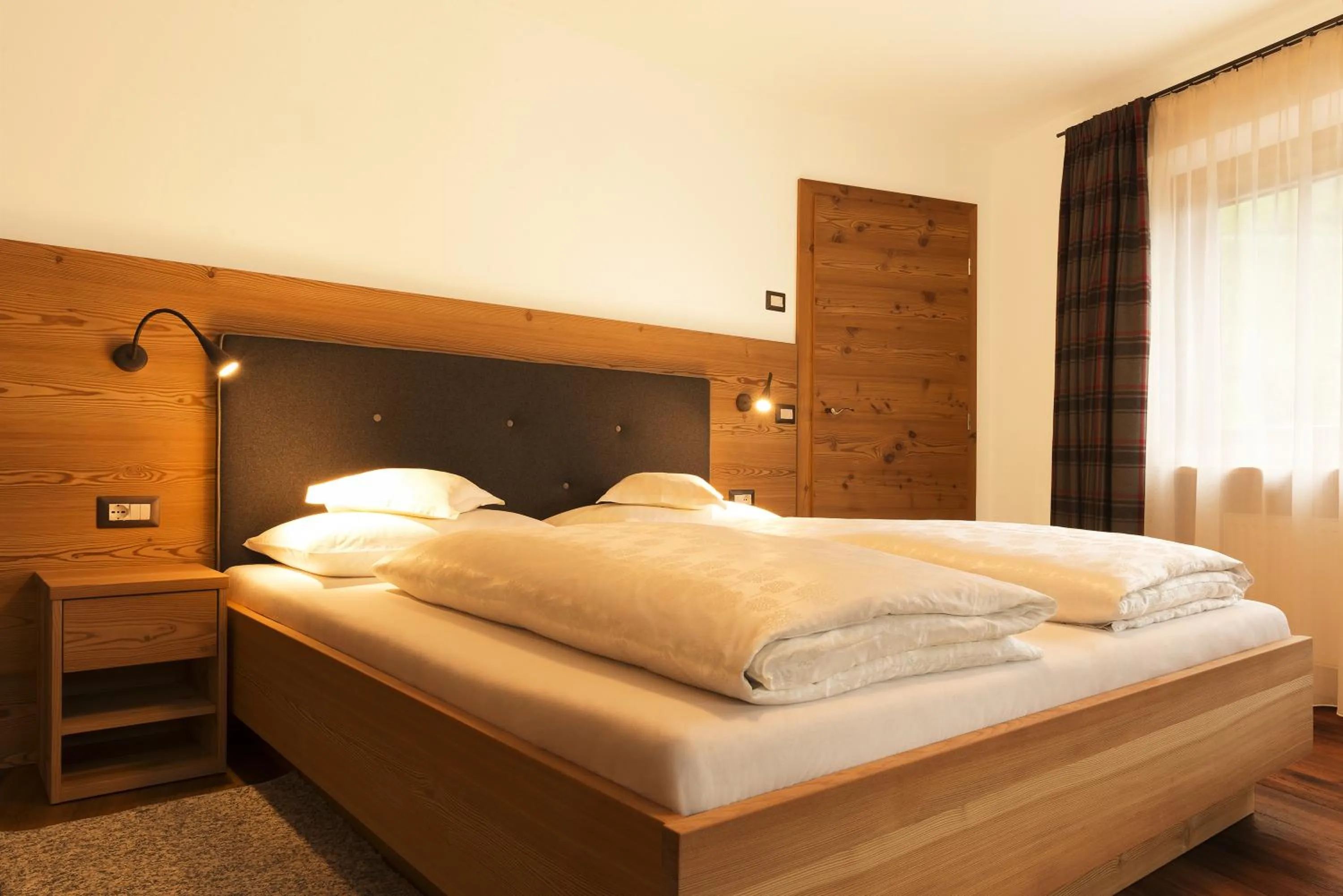 Bed in Garni Hotel Geier