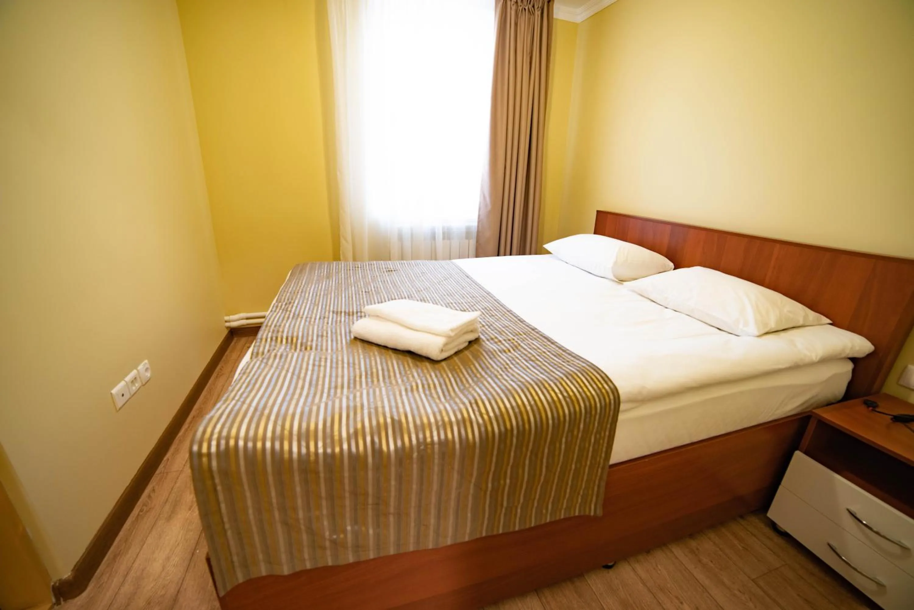 Bed in Chagala Hotel Aksai