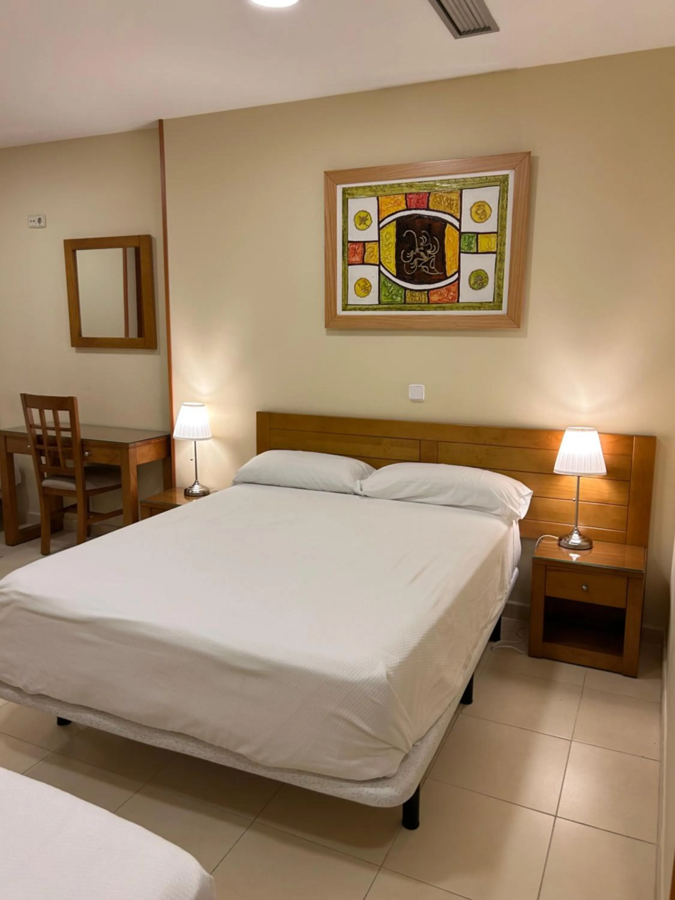 Bed in Hostal Aeropuerto