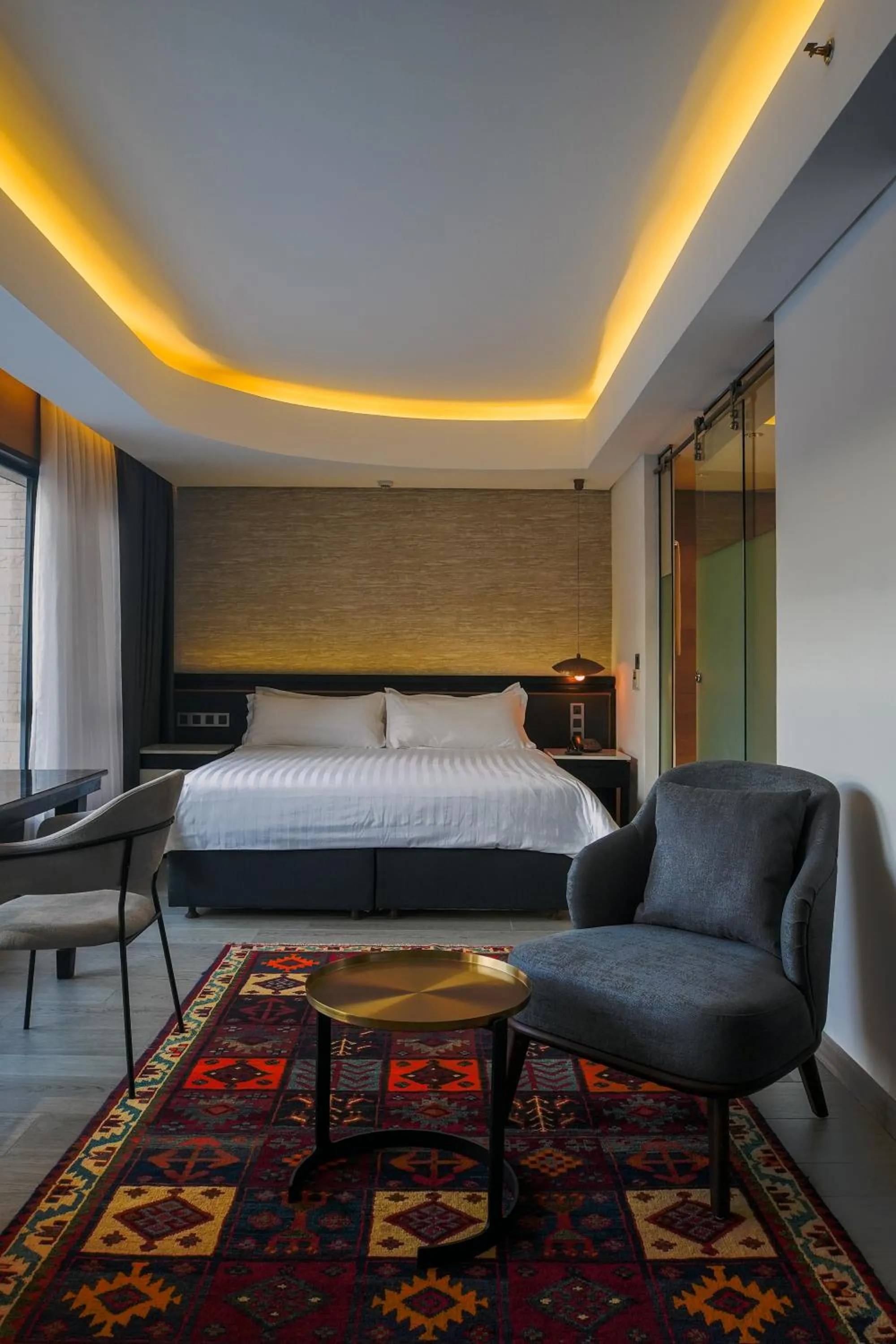 Seating area, Bed in Tribe Hotel, Nairobi, a Member of Design Hotels