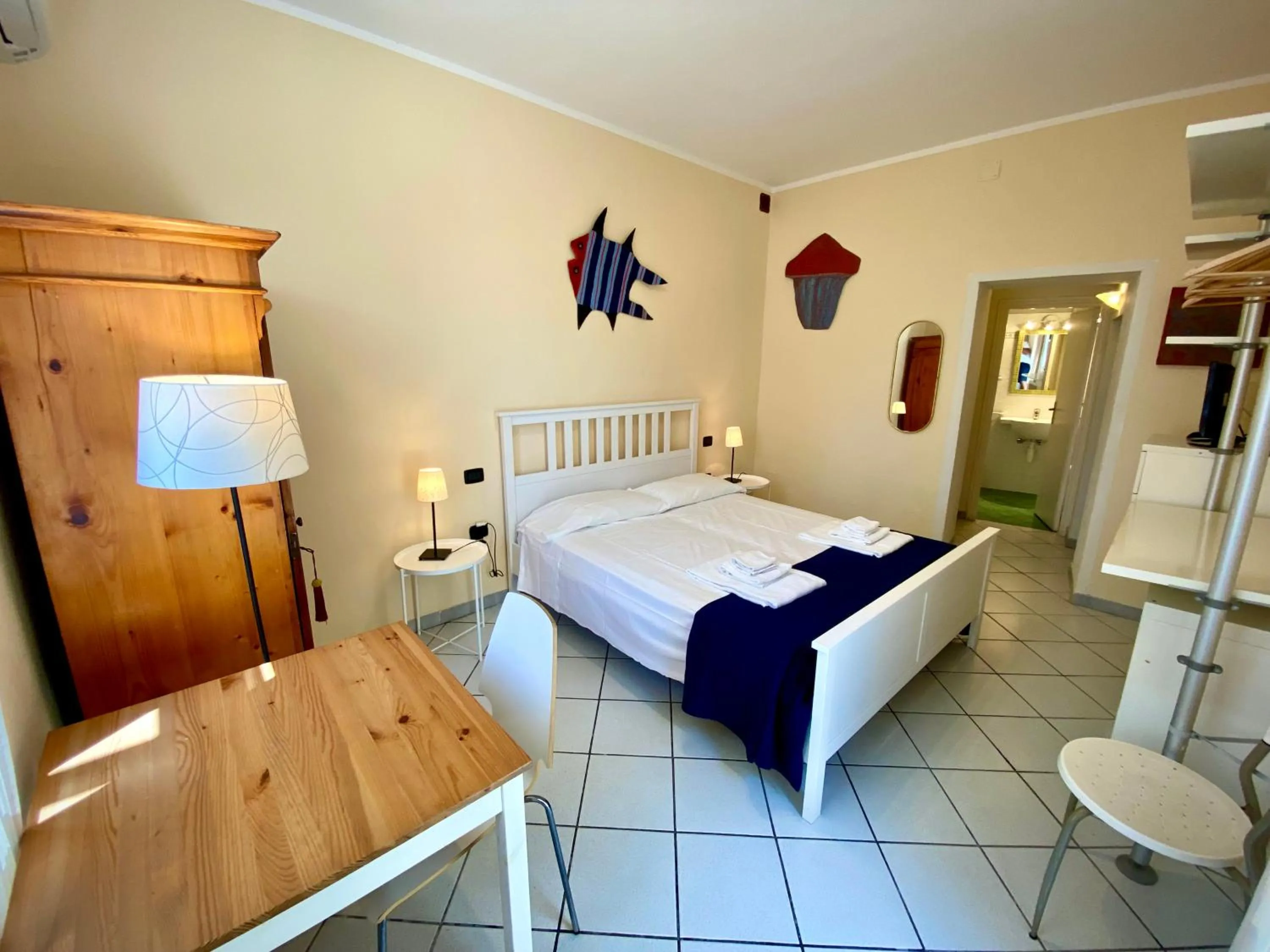 Bed in Belvedere Residenza Mediterranea