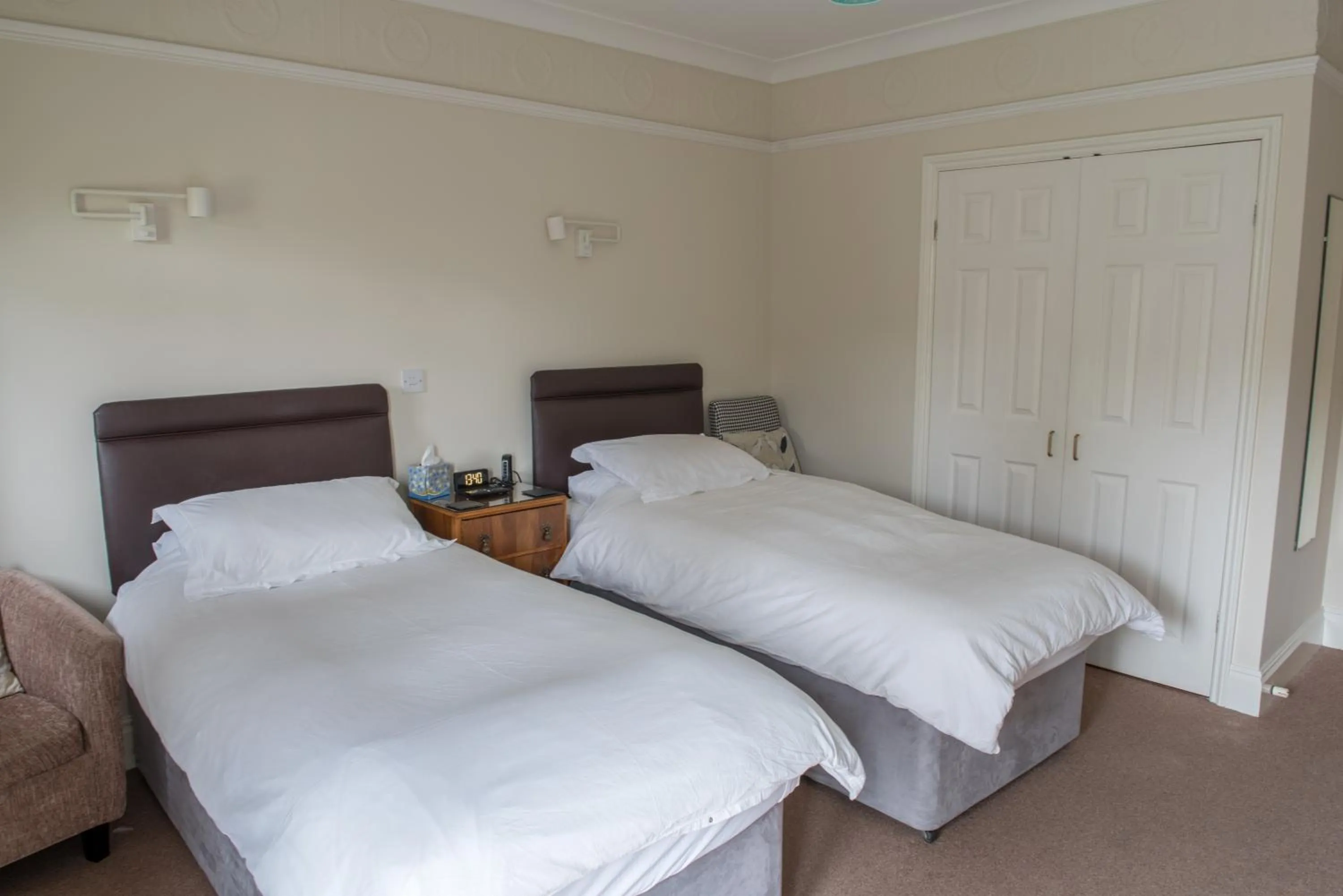 Bed in Toothbrush Rooms at Lattice Lodge - Guest Kitchen & EV Recharging