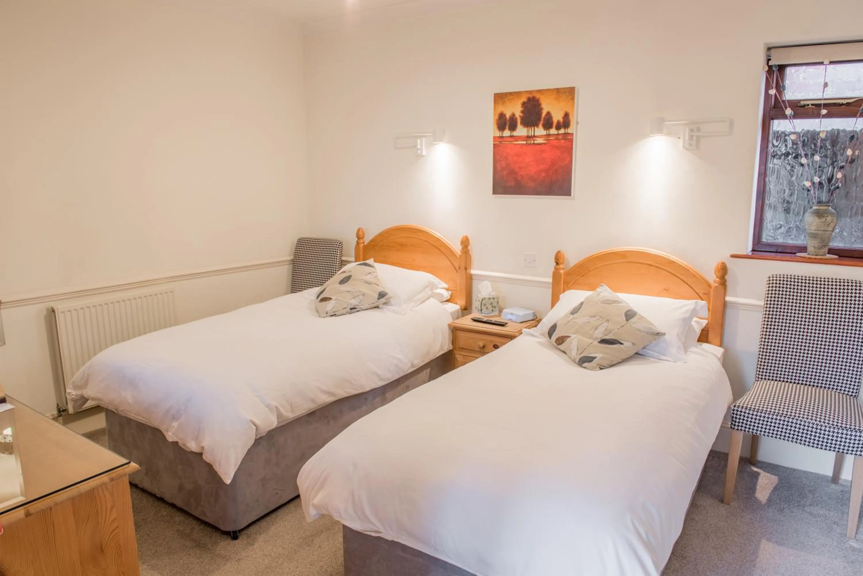 Bed in Toothbrush Rooms at Lattice Lodge - Guest Kitchen & EV Recharging