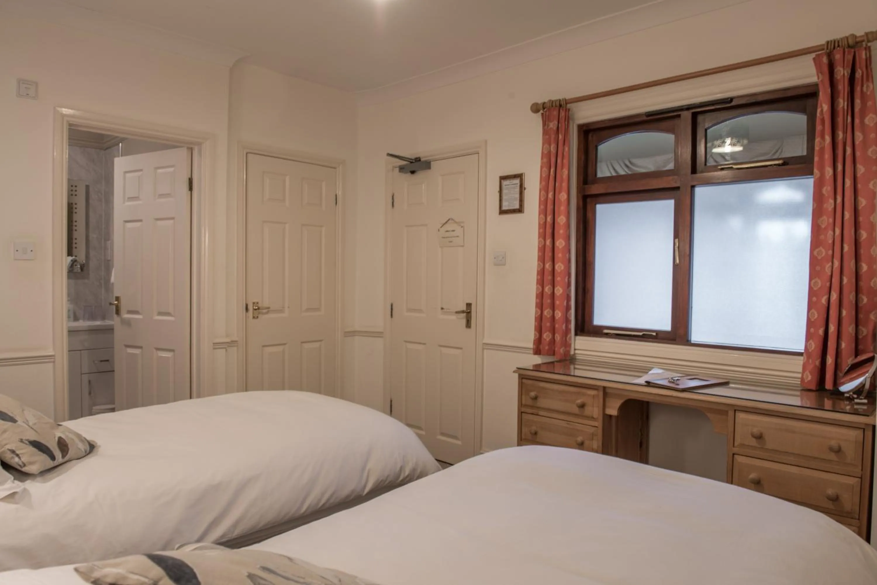 Bed in Toothbrush Rooms at Lattice Lodge - Guest Kitchen & EV Recharging