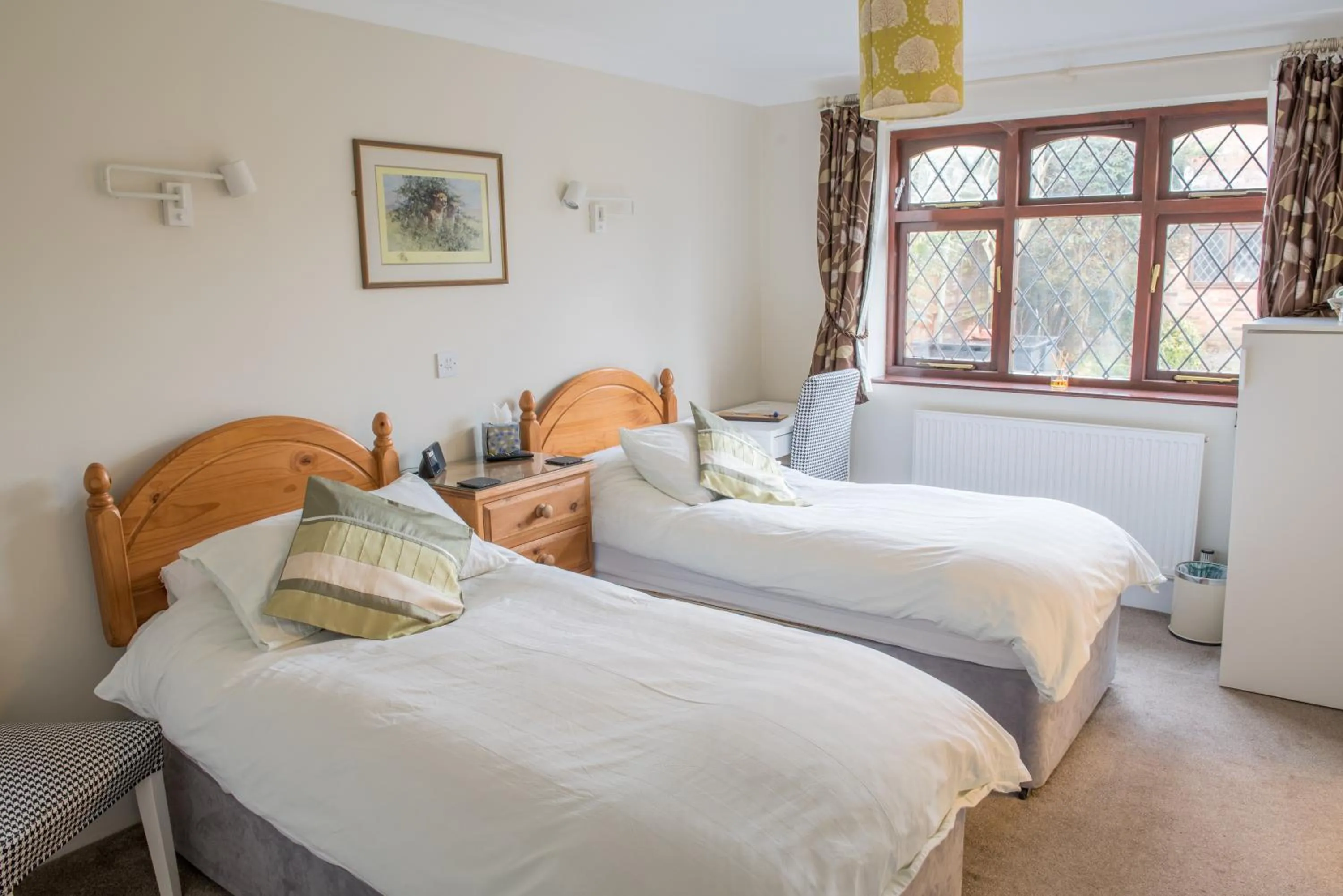 Bed in Toothbrush Rooms at Lattice Lodge - Guest Kitchen & EV Recharging