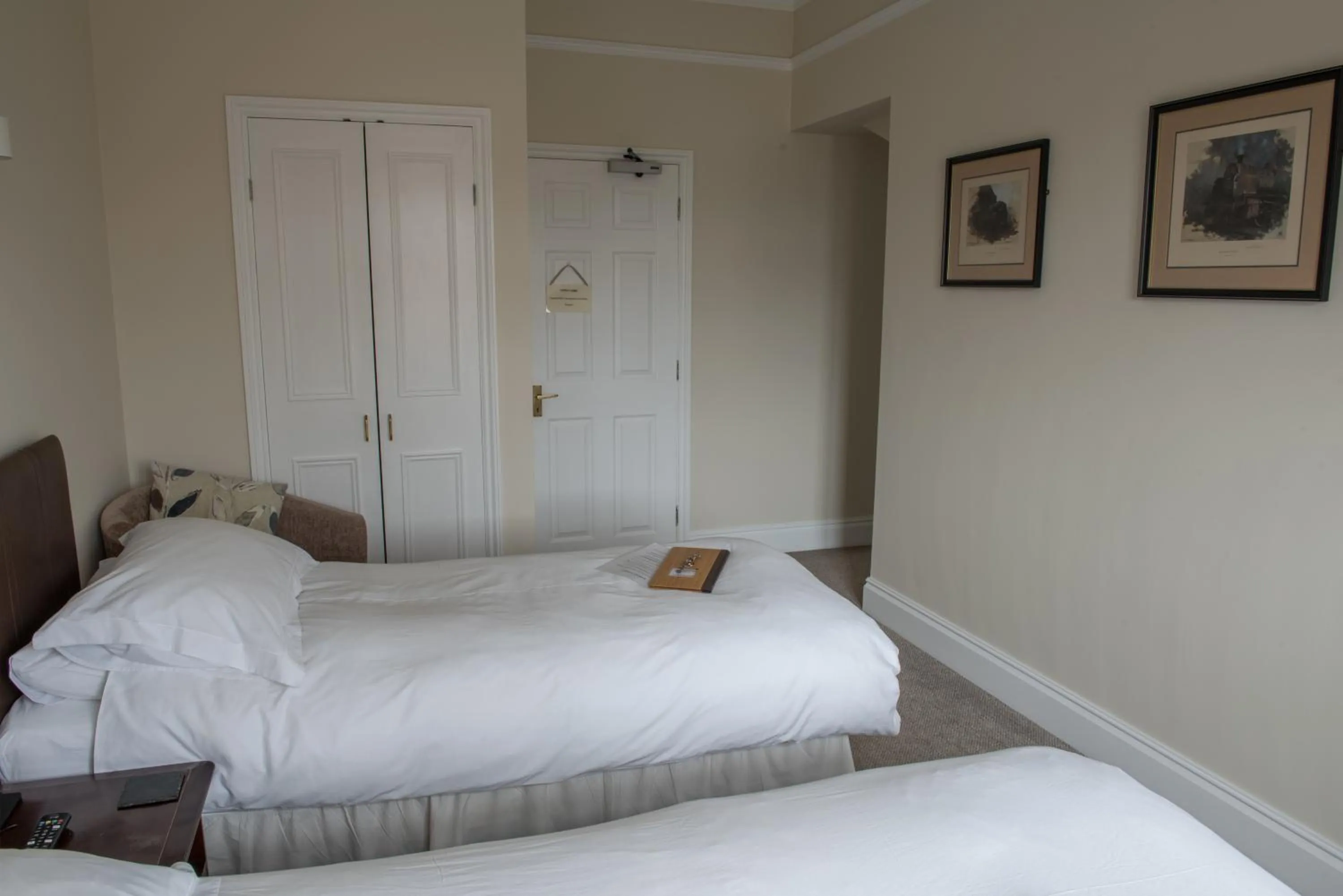 Bed in Toothbrush Rooms at Lattice Lodge - Guest Kitchen & EV Recharging