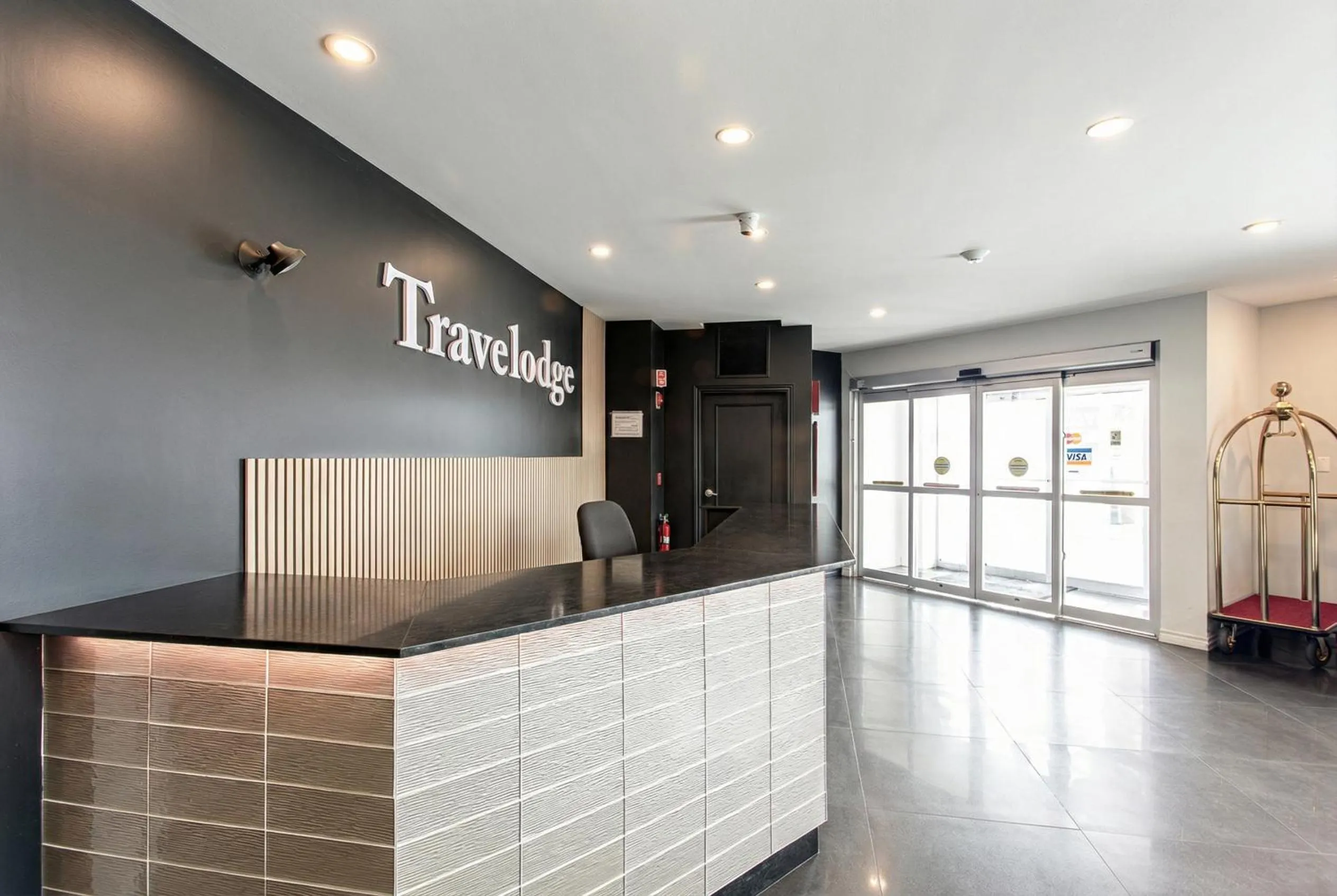 Property logo or sign in Travelodge by Wyndham Rigaud