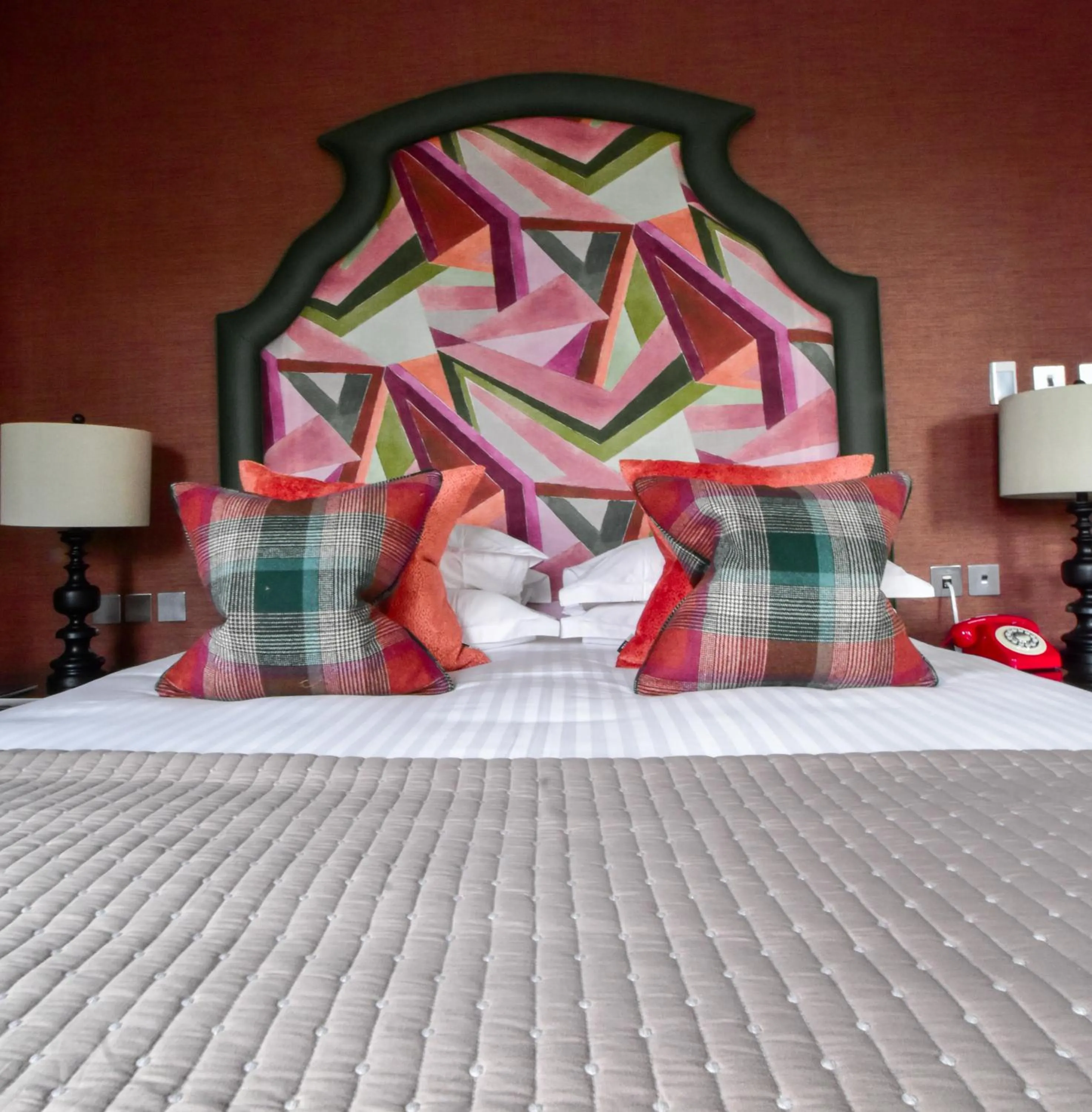 Bed in The Rutland Hotel & Apartments