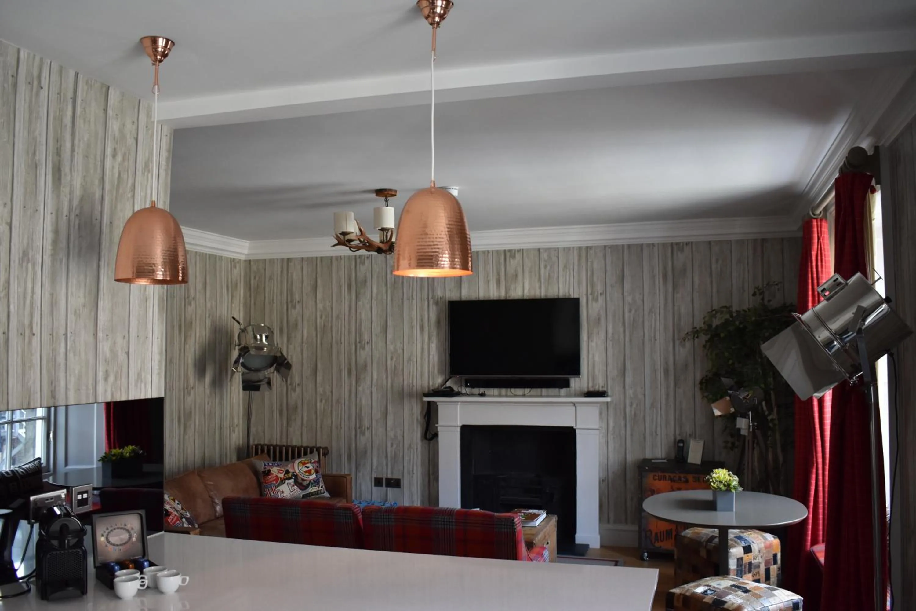 Communal lounge/ TV room in The Rutland Hotel & Apartments