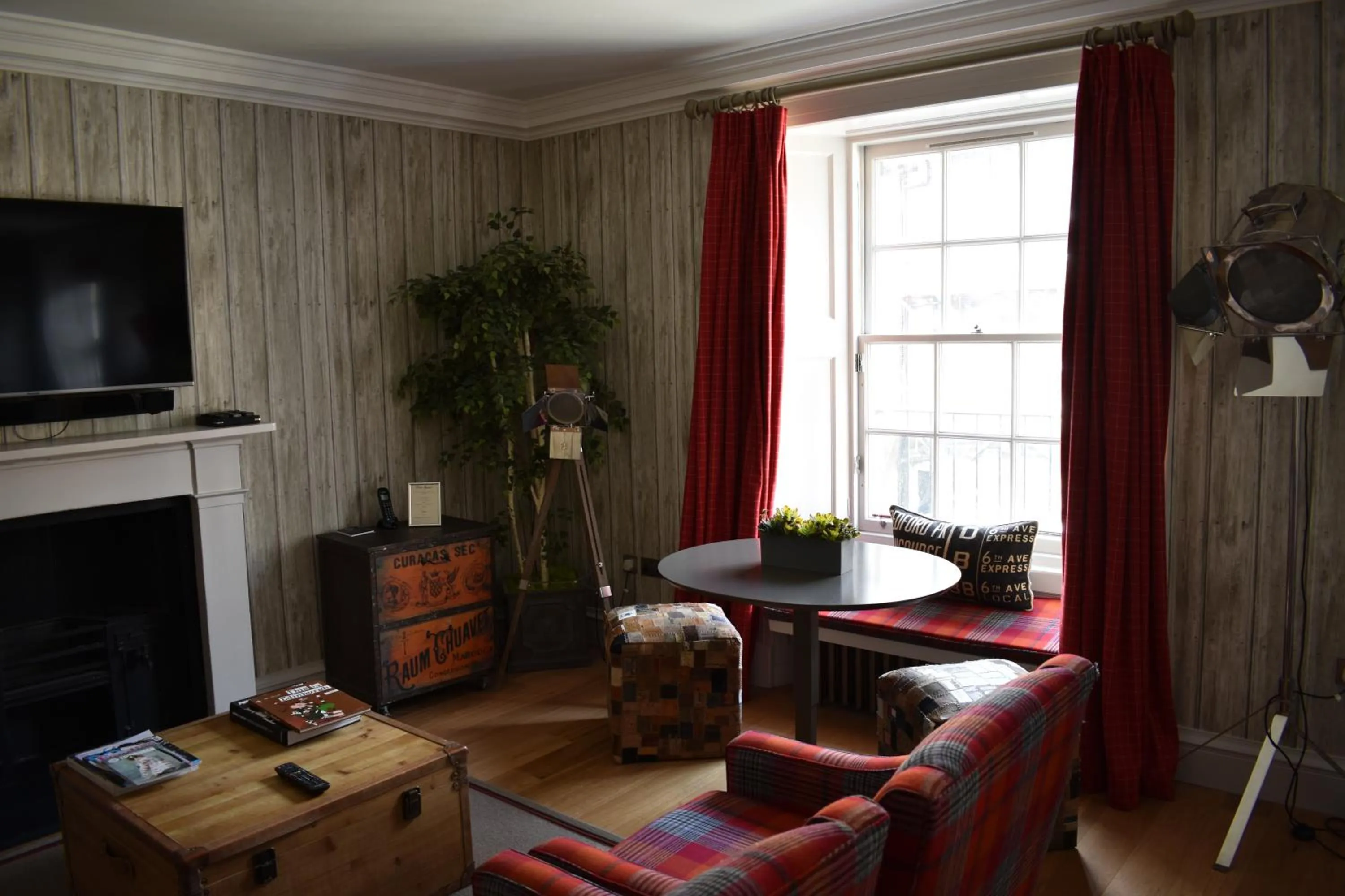 Communal lounge/ TV room in The Rutland Hotel & Apartments