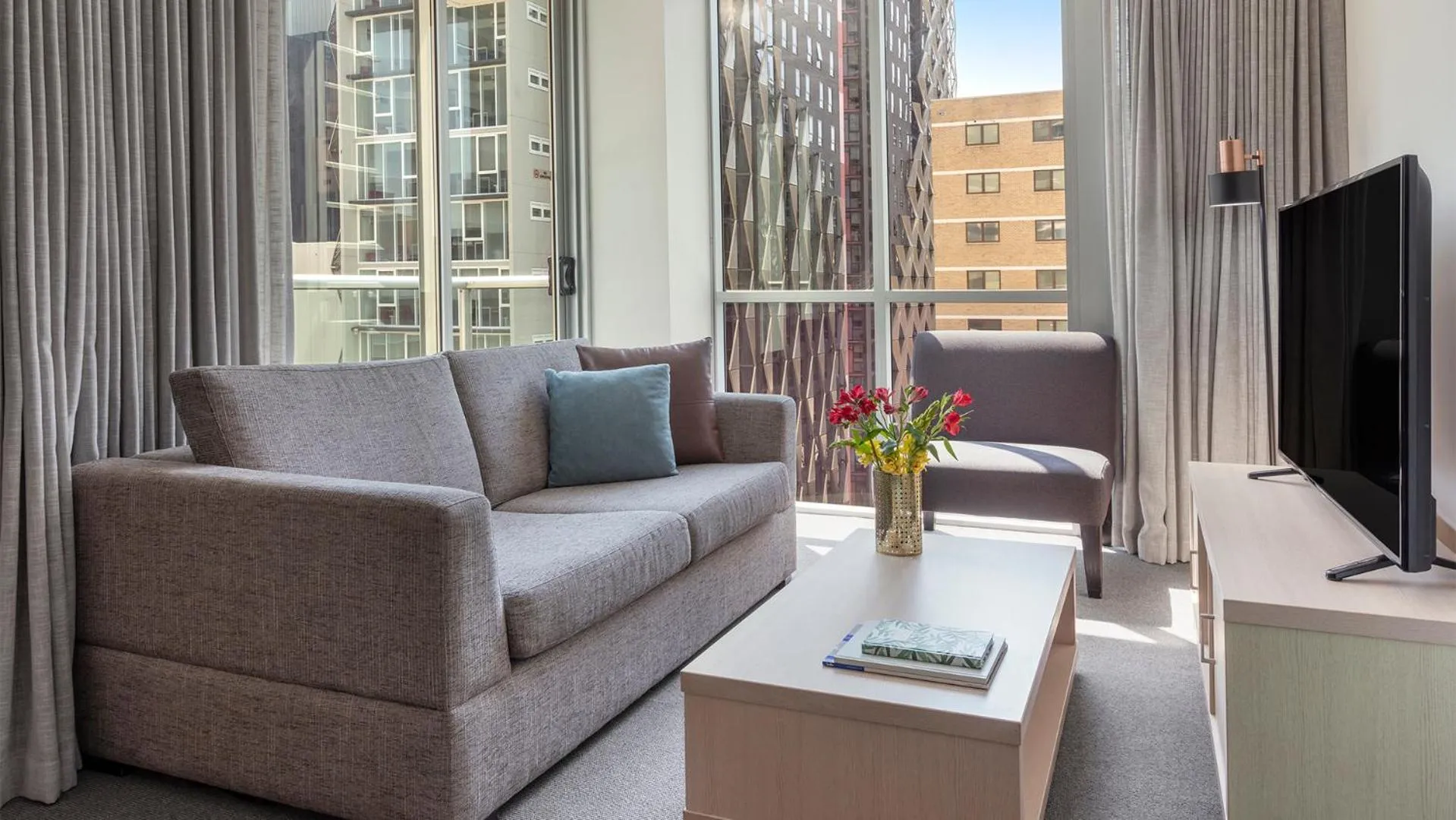 Living room in Oaks Brisbane Festival Suites