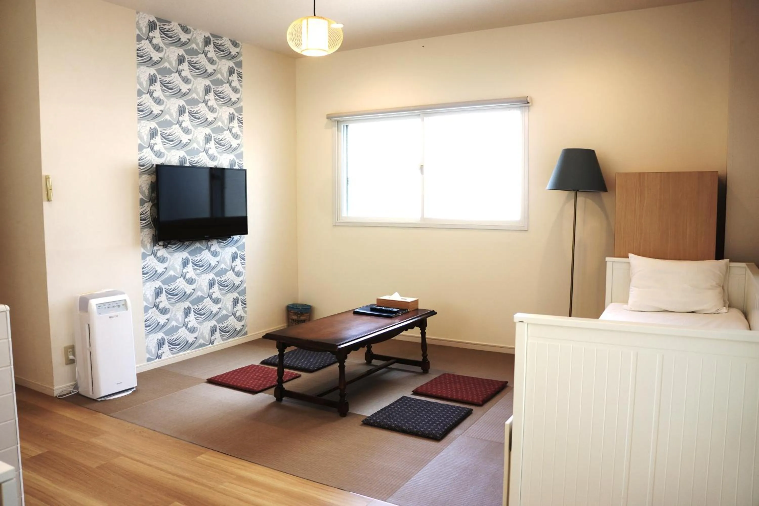 Living room, Bed in TEN APARTMENT HOTEL