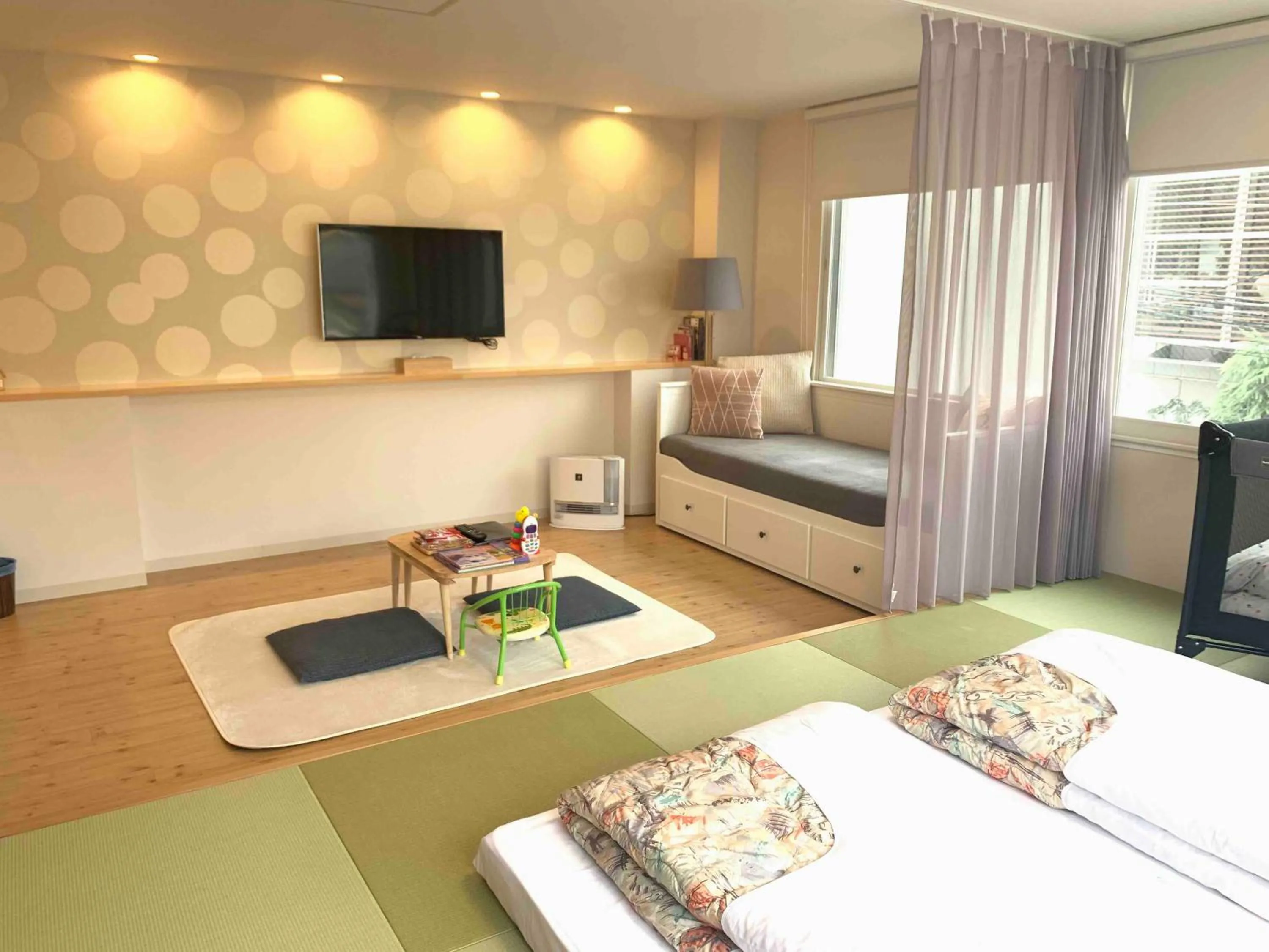 Bed in TEN APARTMENT HOTEL