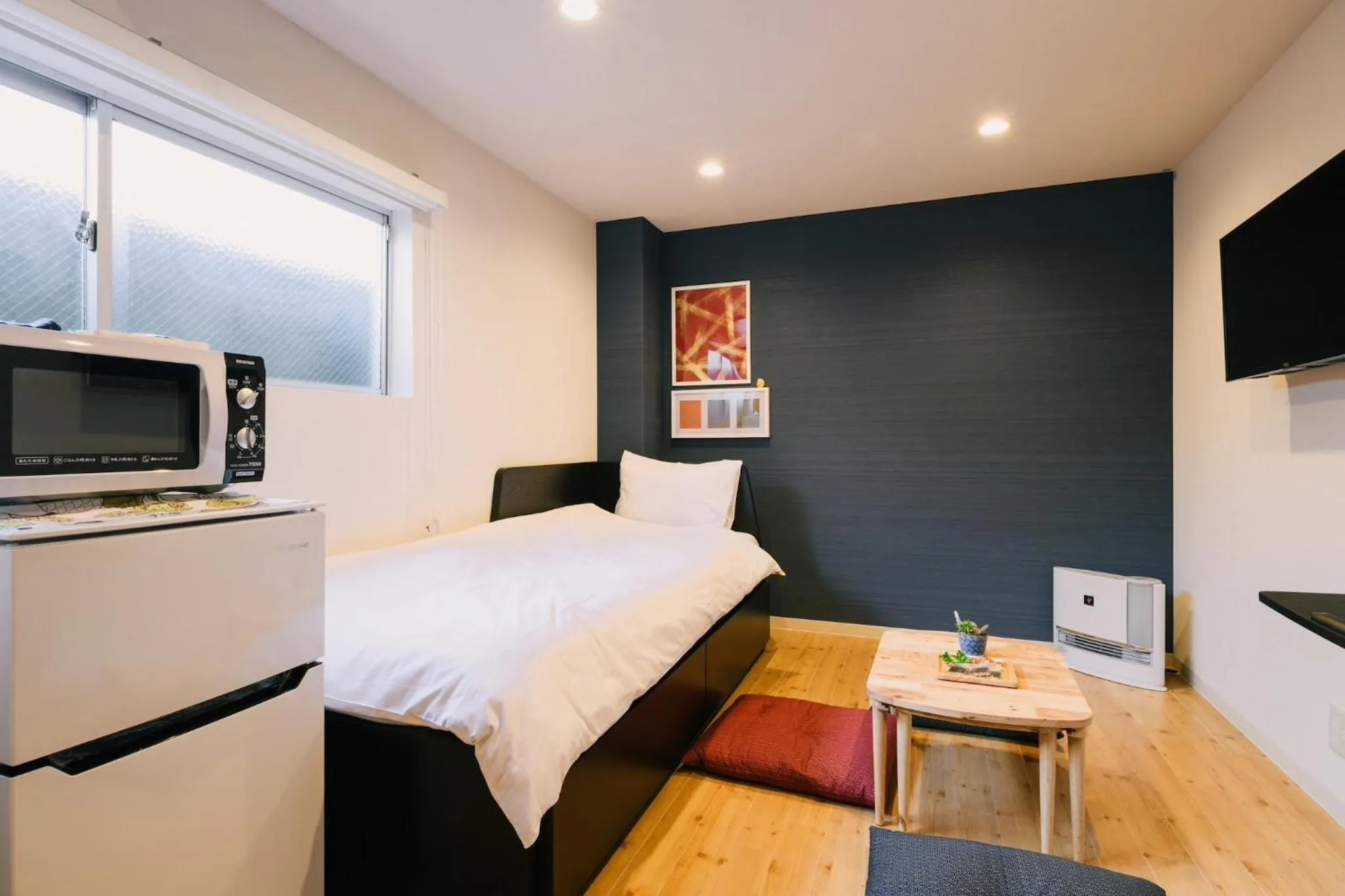 Bed in TEN APARTMENT HOTEL