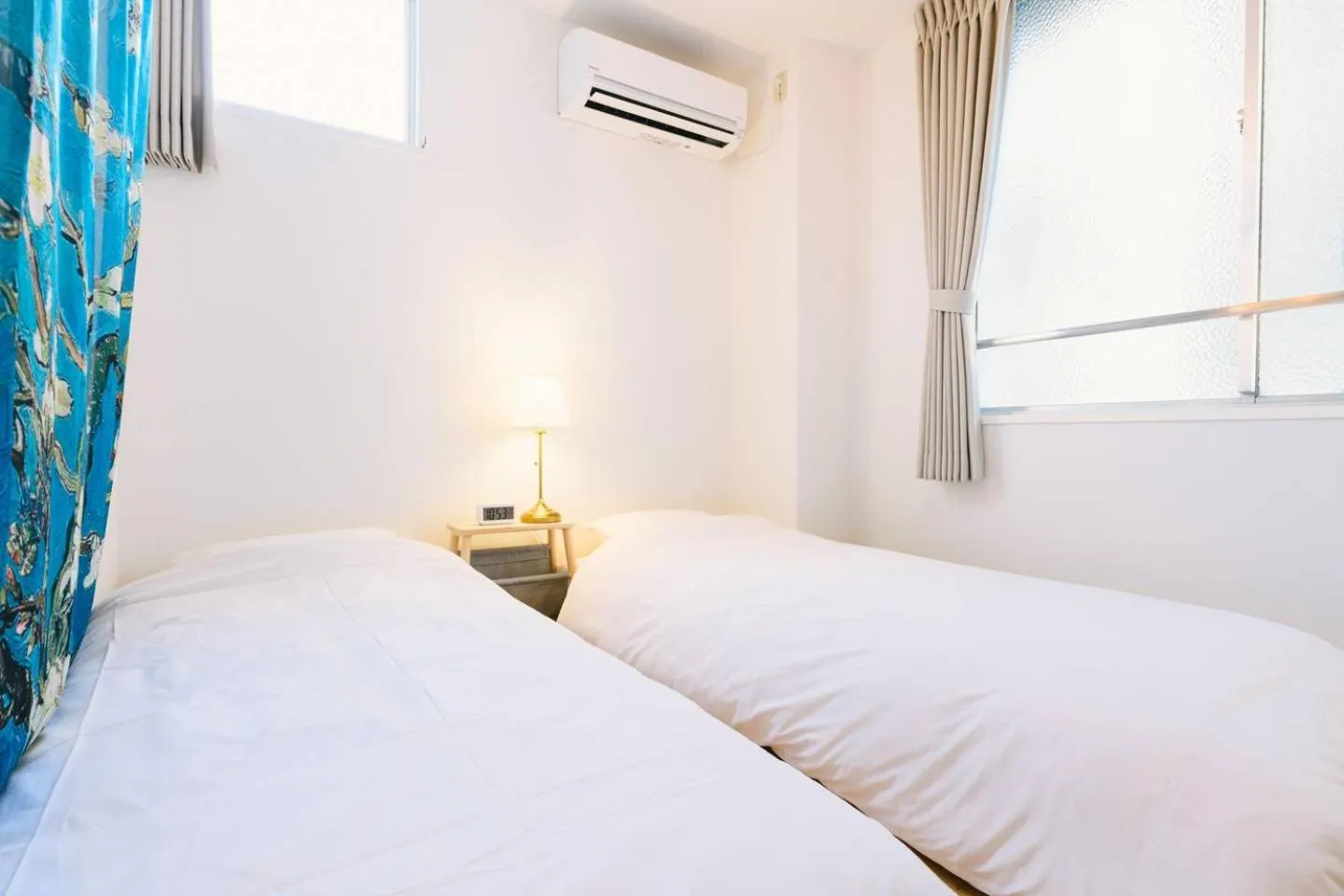 Bed in TEN APARTMENT HOTEL