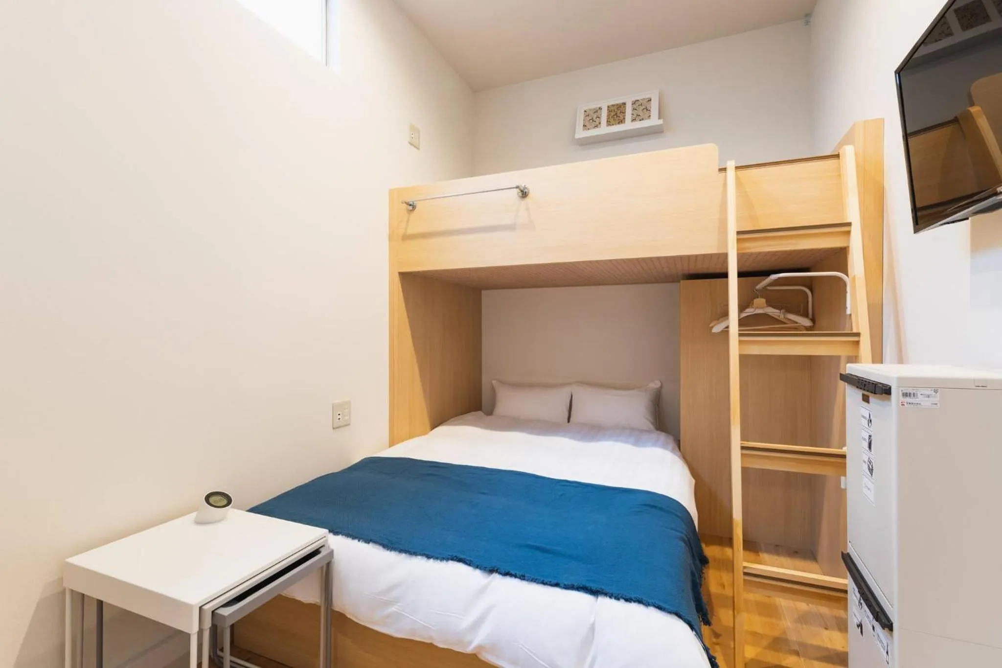 Bed in TEN APARTMENT HOTEL