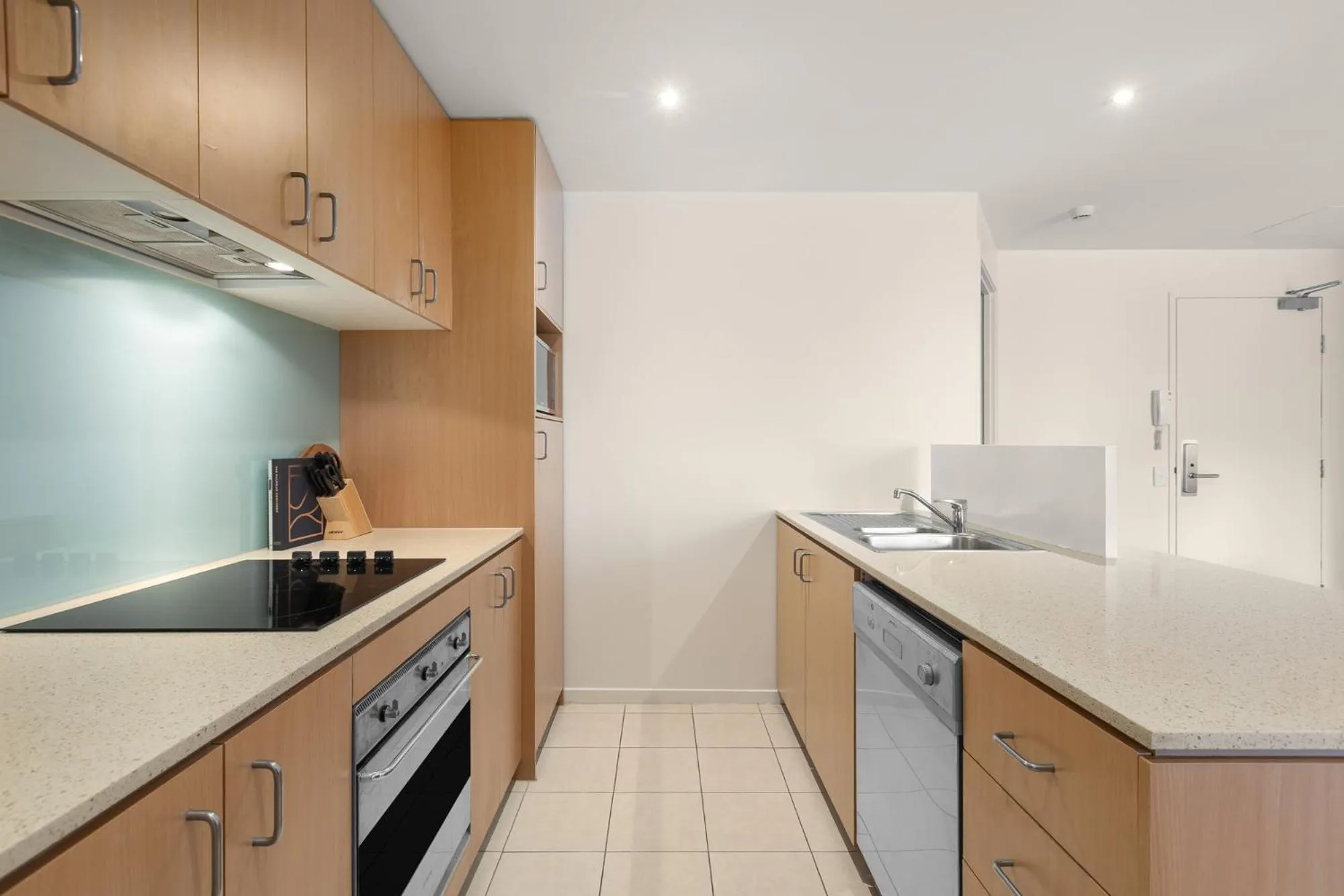 kitchen in Nolo Apartments Lonsdale St
