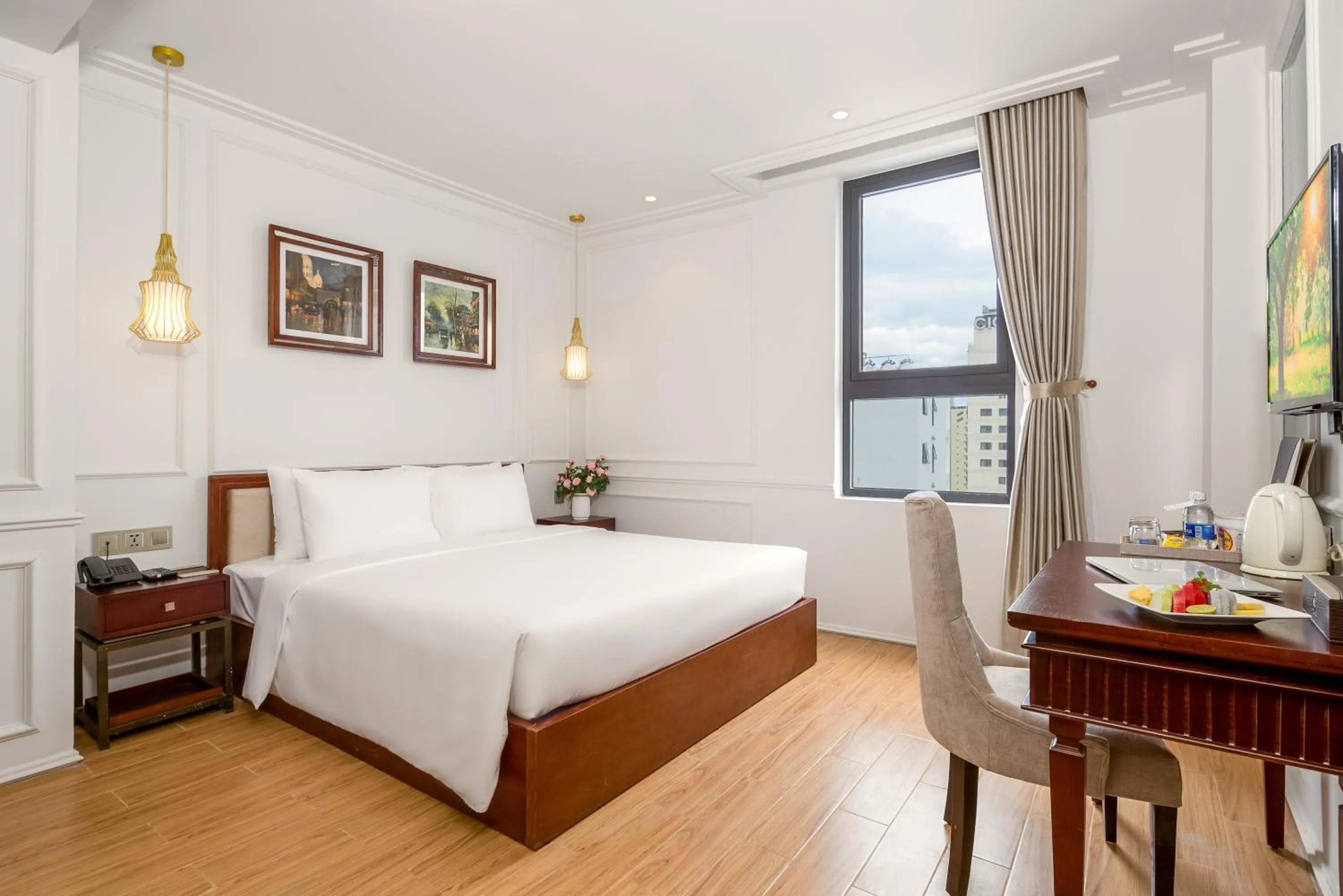 Seating area, Bed in Menora Grand Da Nang