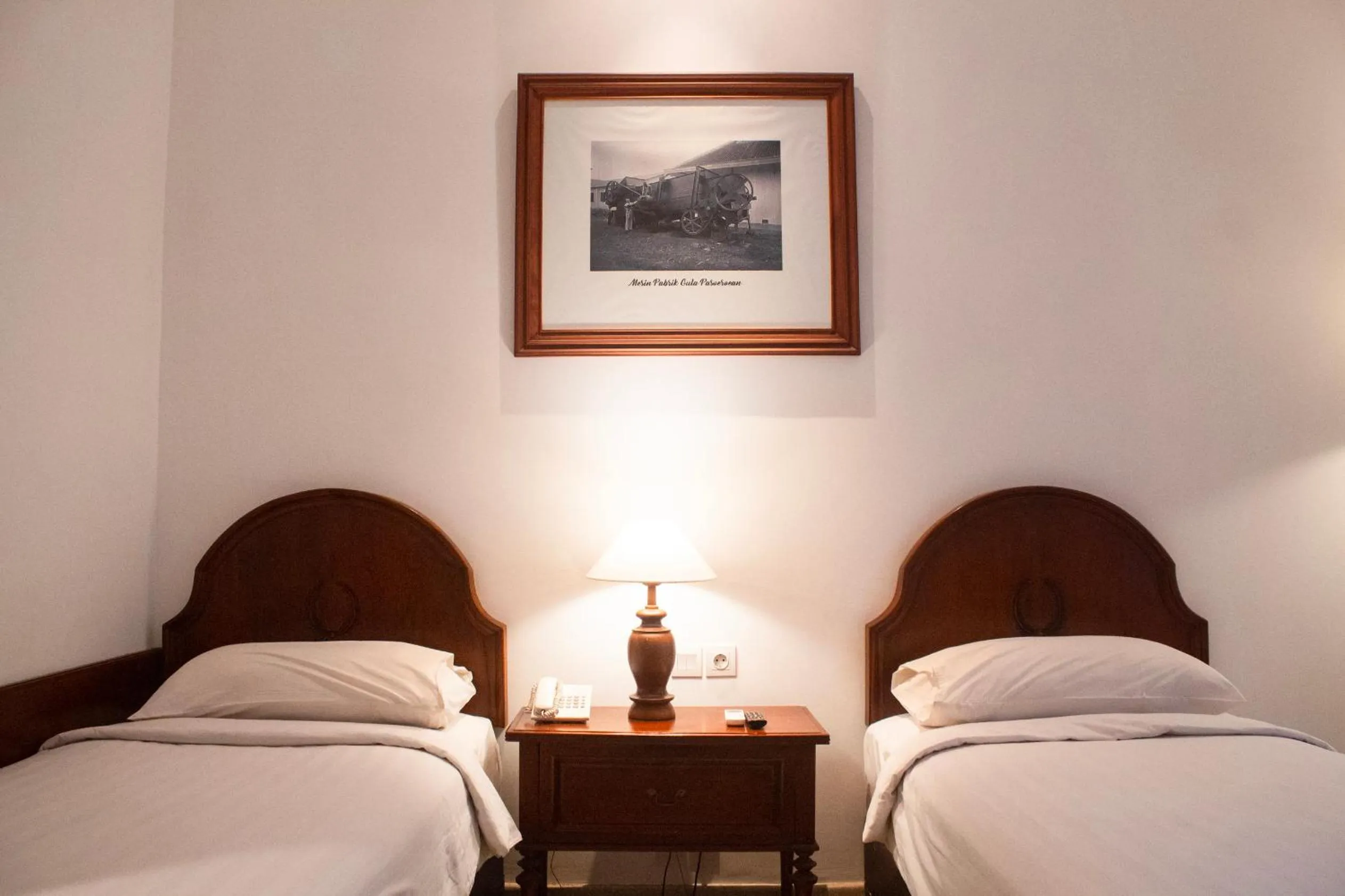 Bed in Daroessalam Syariah Heritage Hotel