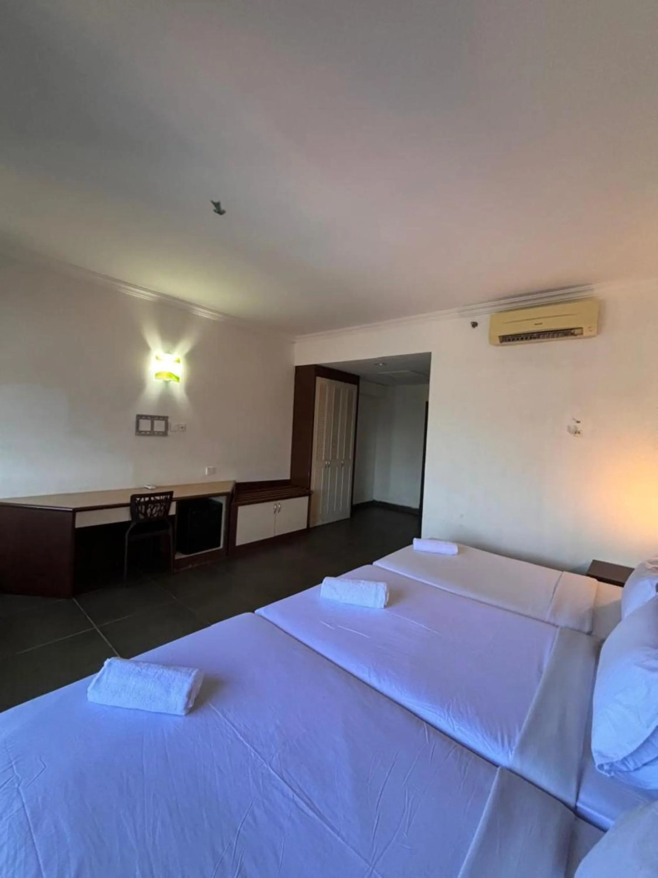 Bed in Bella Vista Express Hotel