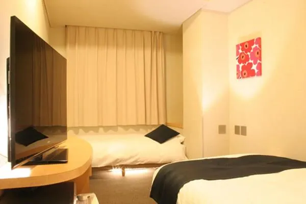 Bed in Hotel Estacion Hikone