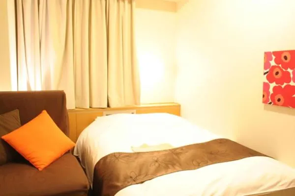 Bed in Hotel Estacion Hikone