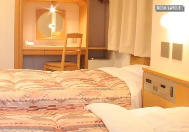 Bed in Hotel Estacion Hikone