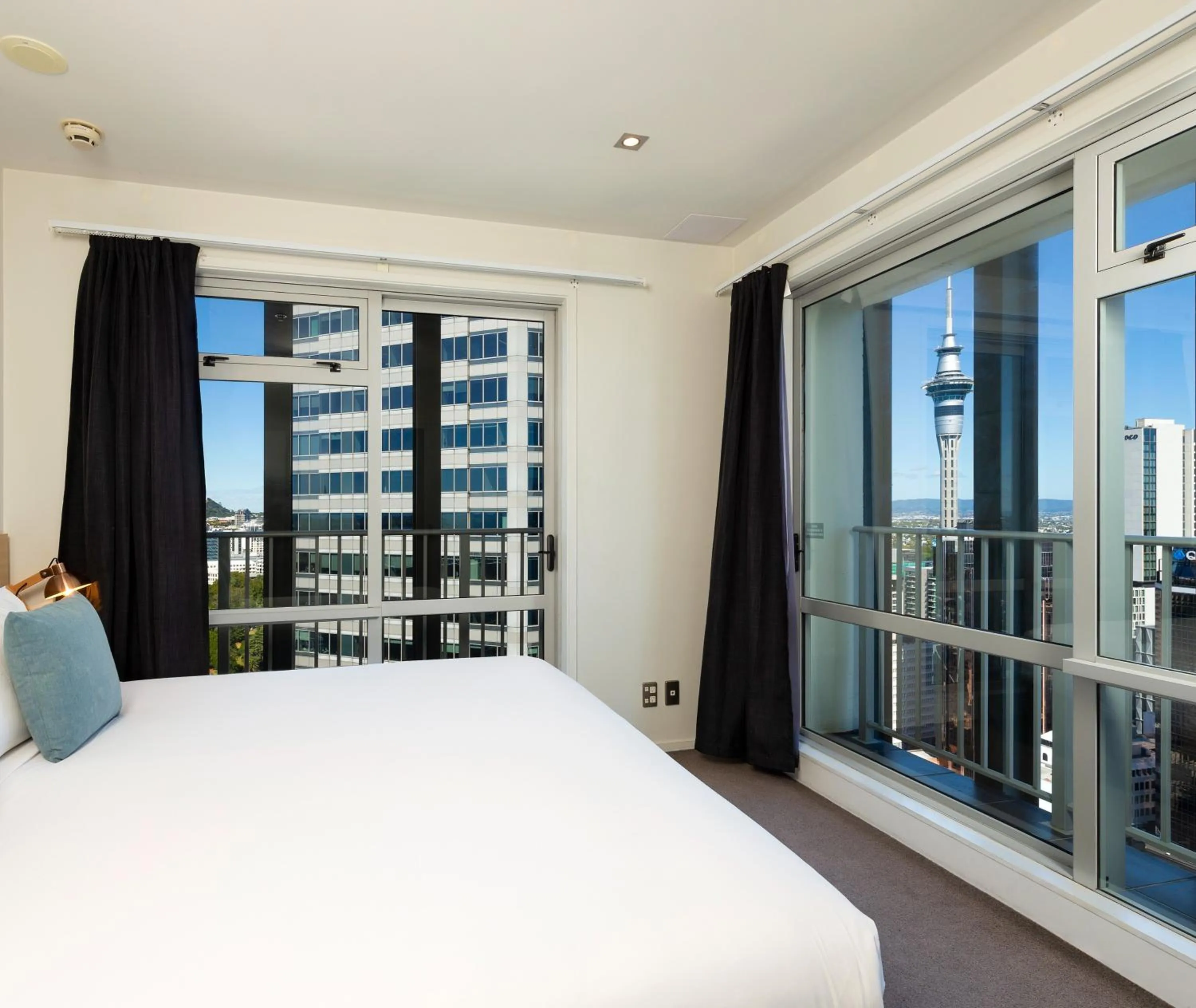 Bed in Auckland Harbour Suites