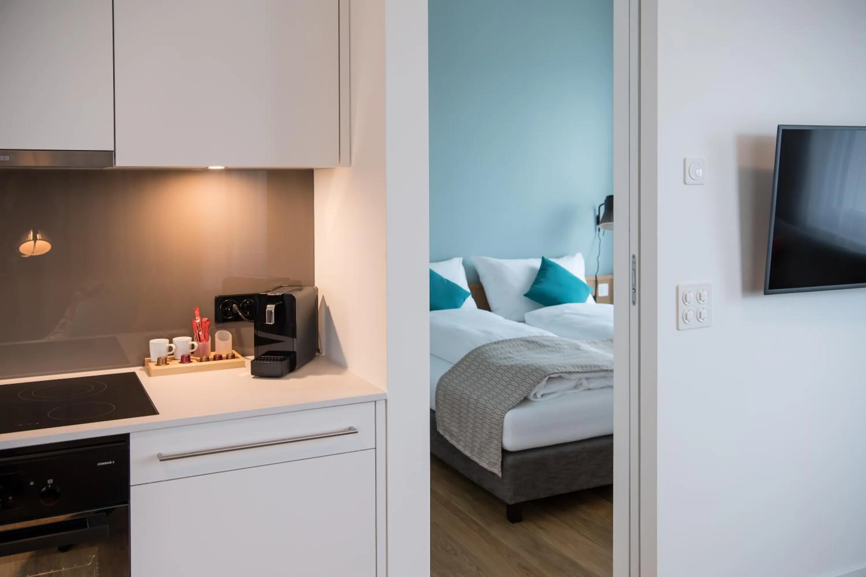 Kitchen or kitchenette, Bed in Aparthotel Luzern West