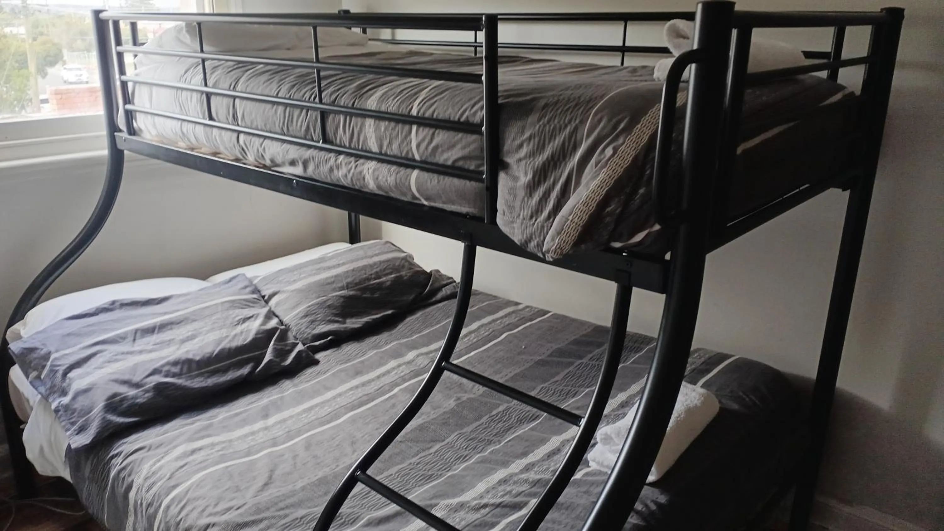 Bed in The Eastern Hotel Accommodation