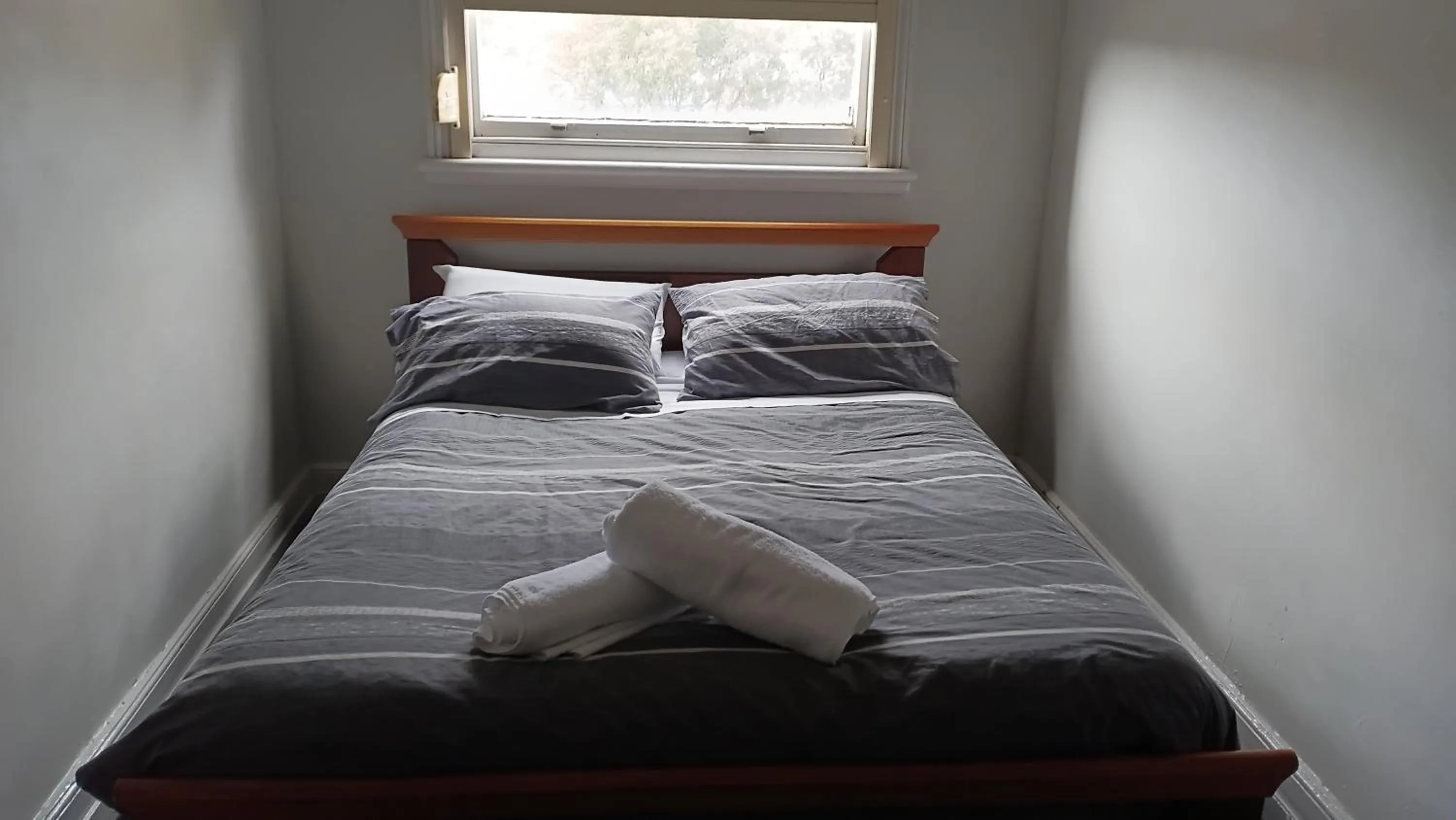 Bed in The Eastern Hotel Accommodation