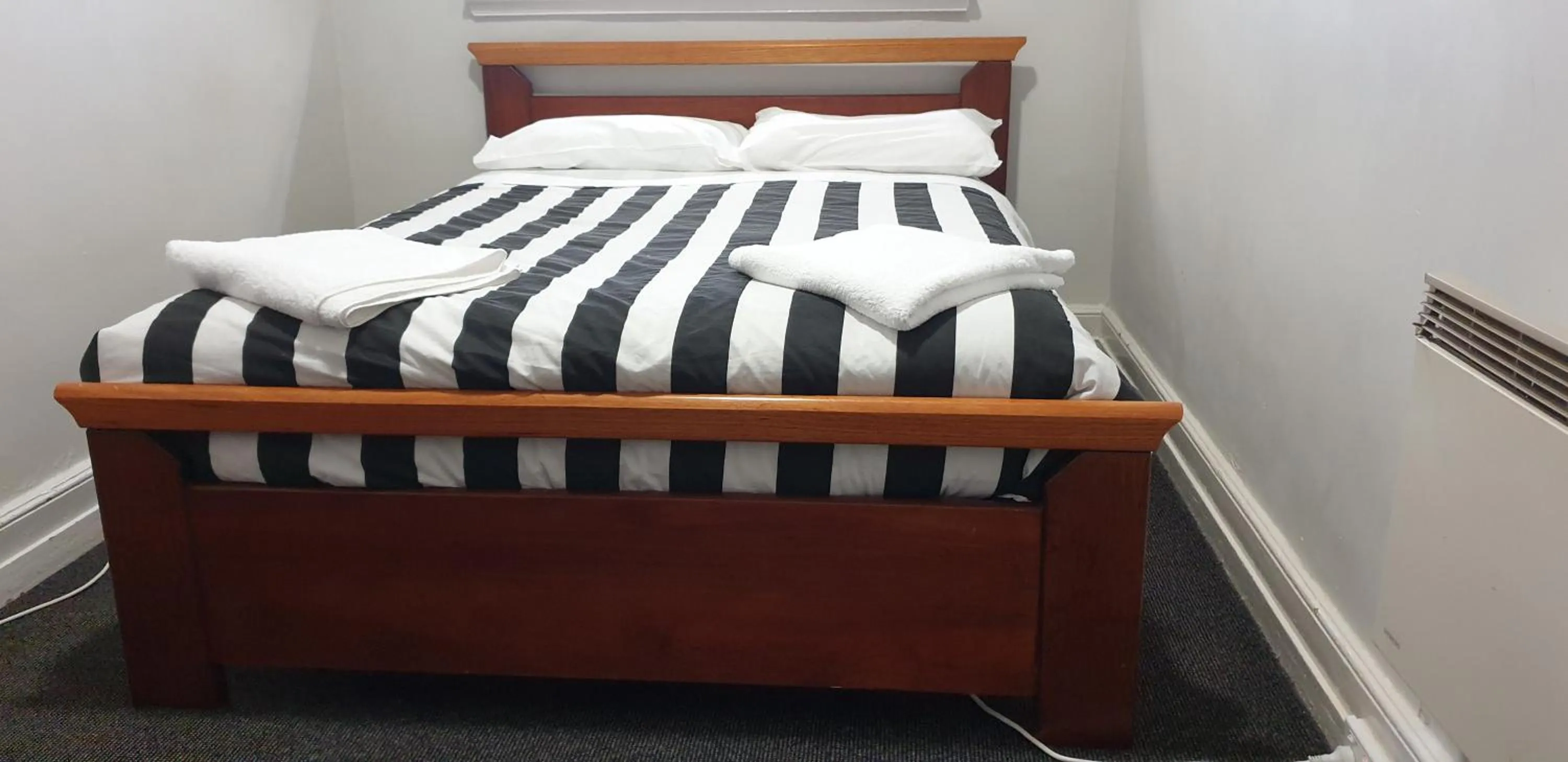 Bed in The Eastern Hotel Accommodation