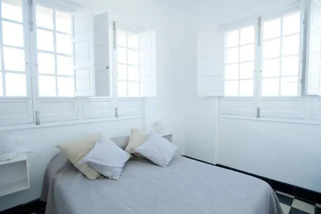 Bedroom, Bed in Apartamentos Calle Rosario