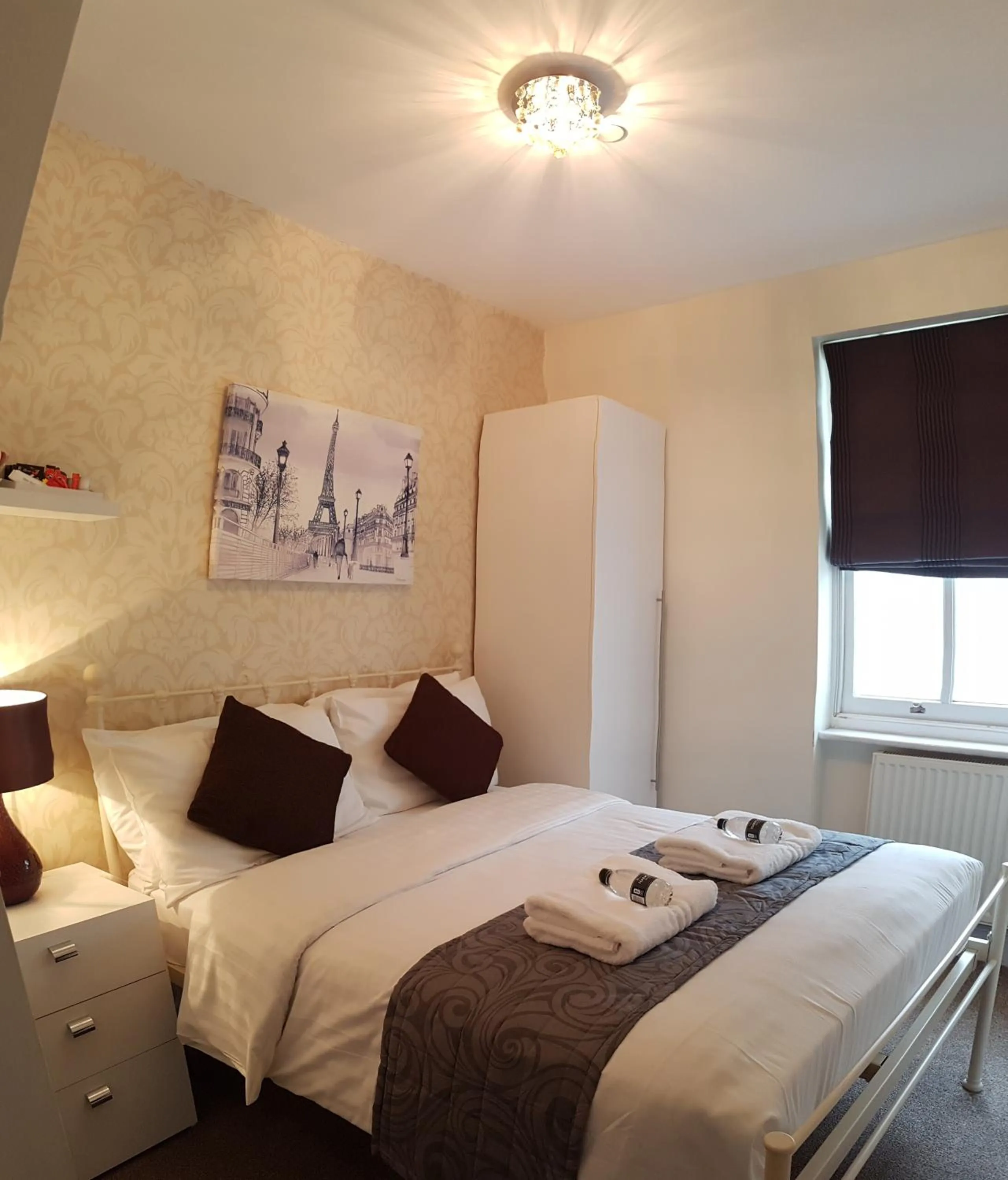 Bed in Grand Pier Guest House