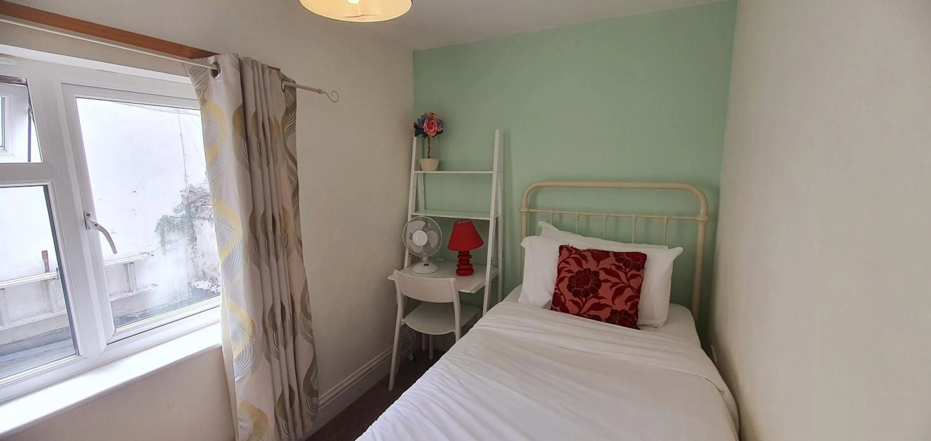 Bed in Grand Pier Guest House