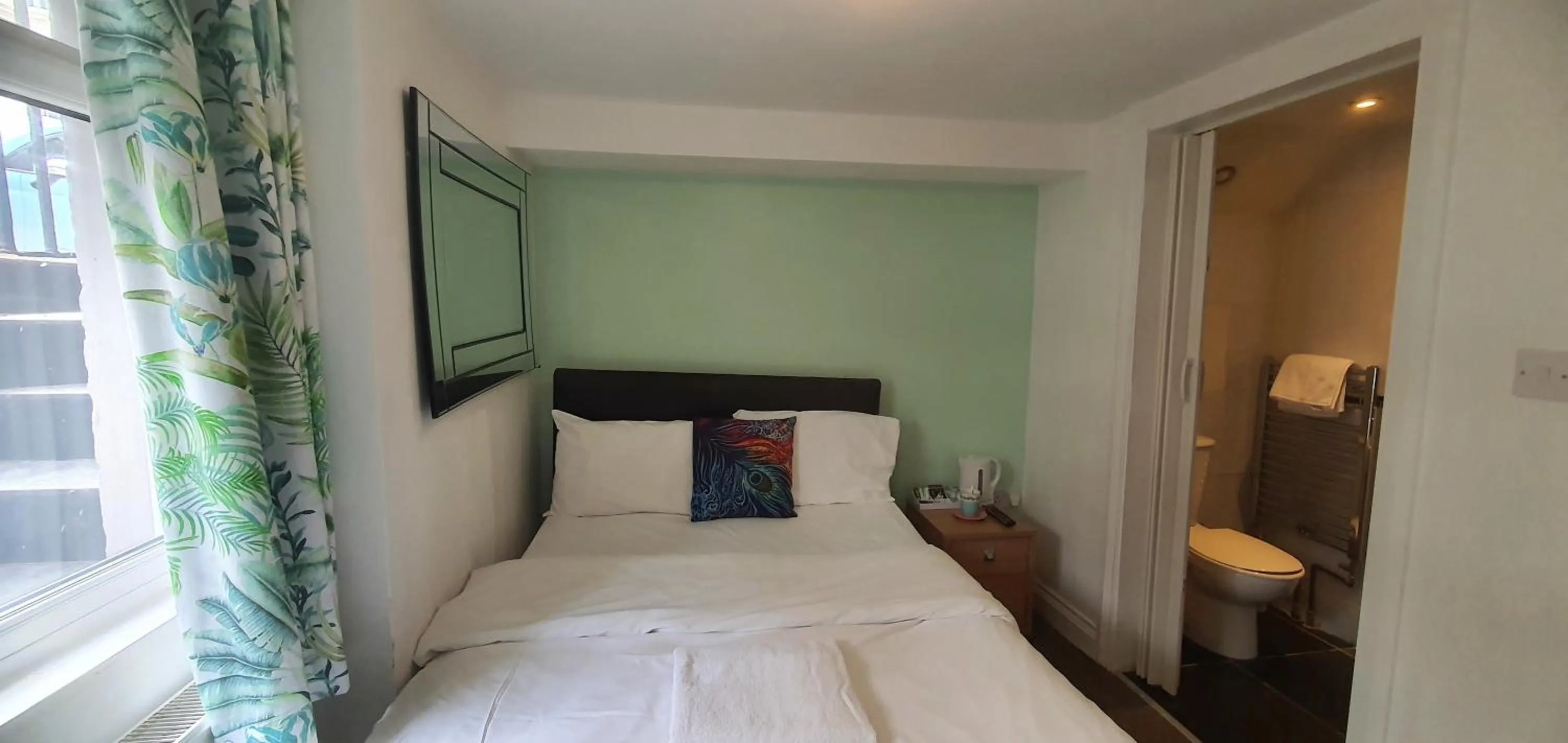 Bed in Grand Pier Guest House