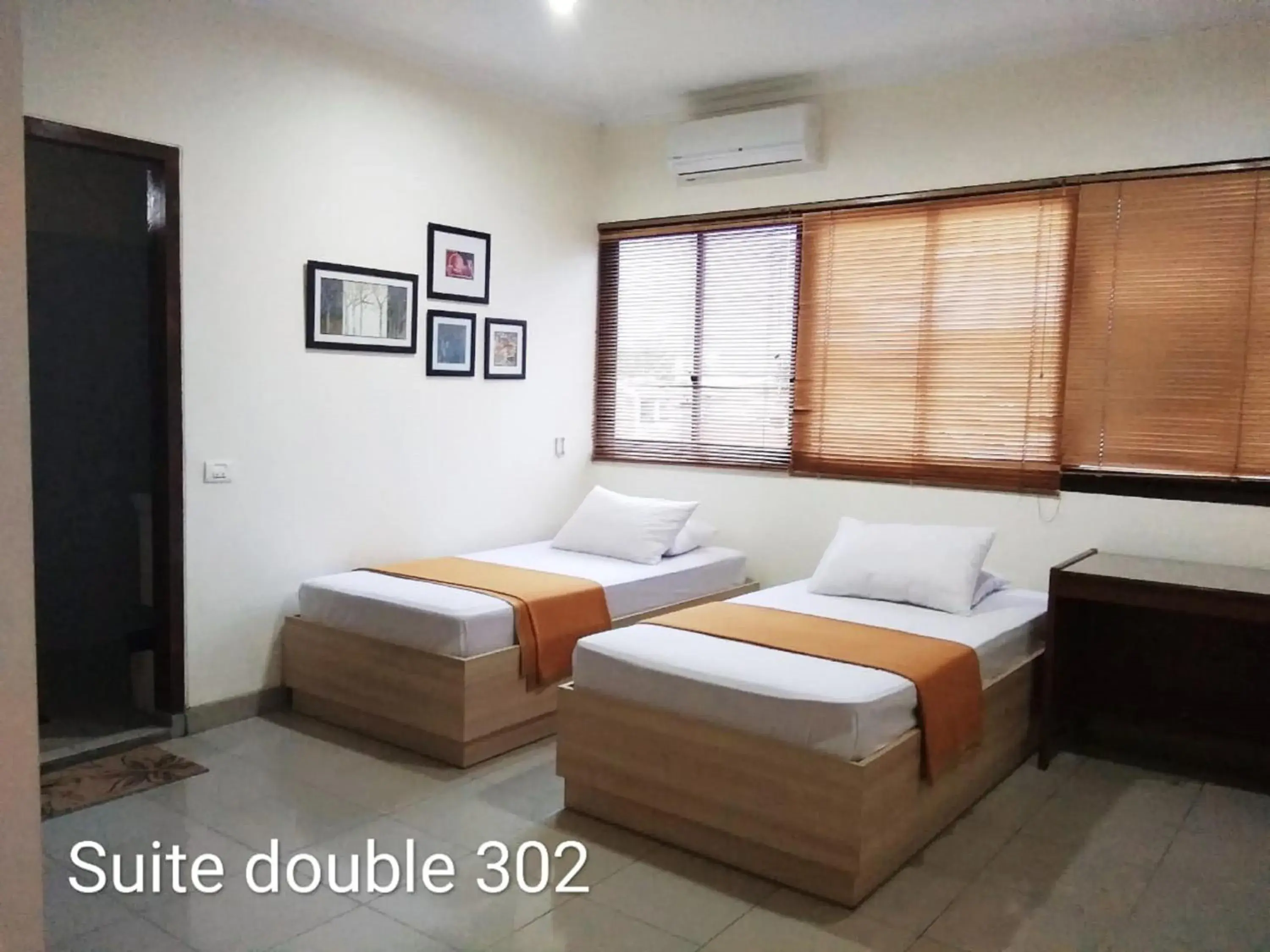 Standard Twin Room in GK Gallery Rumah Sewa Standard Twin Room in GK Gallery Rumah Sewa