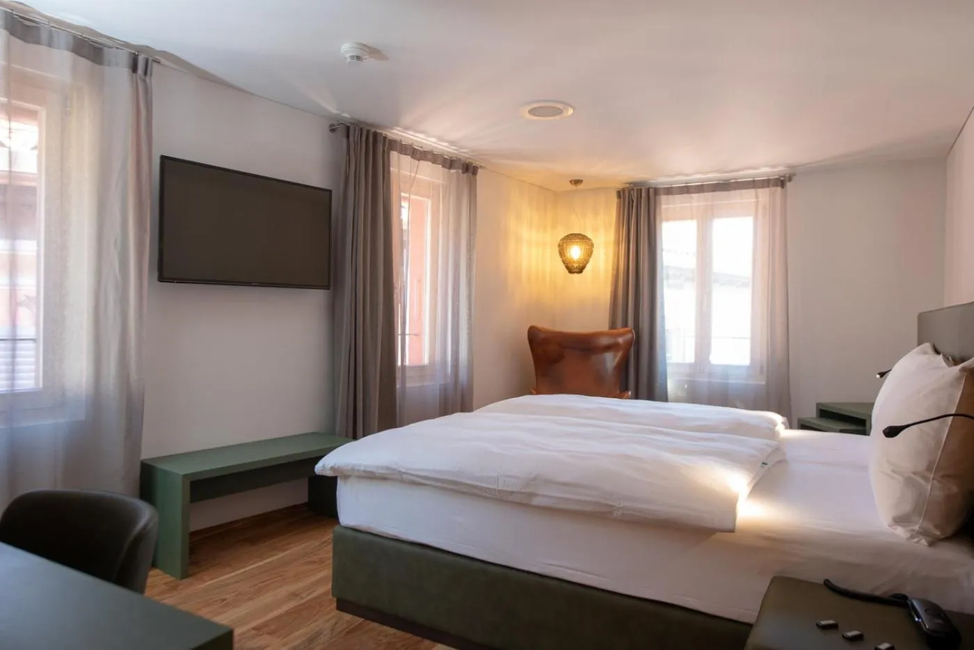 Communal lounge/ TV room, Bed in Hotel Gabbani