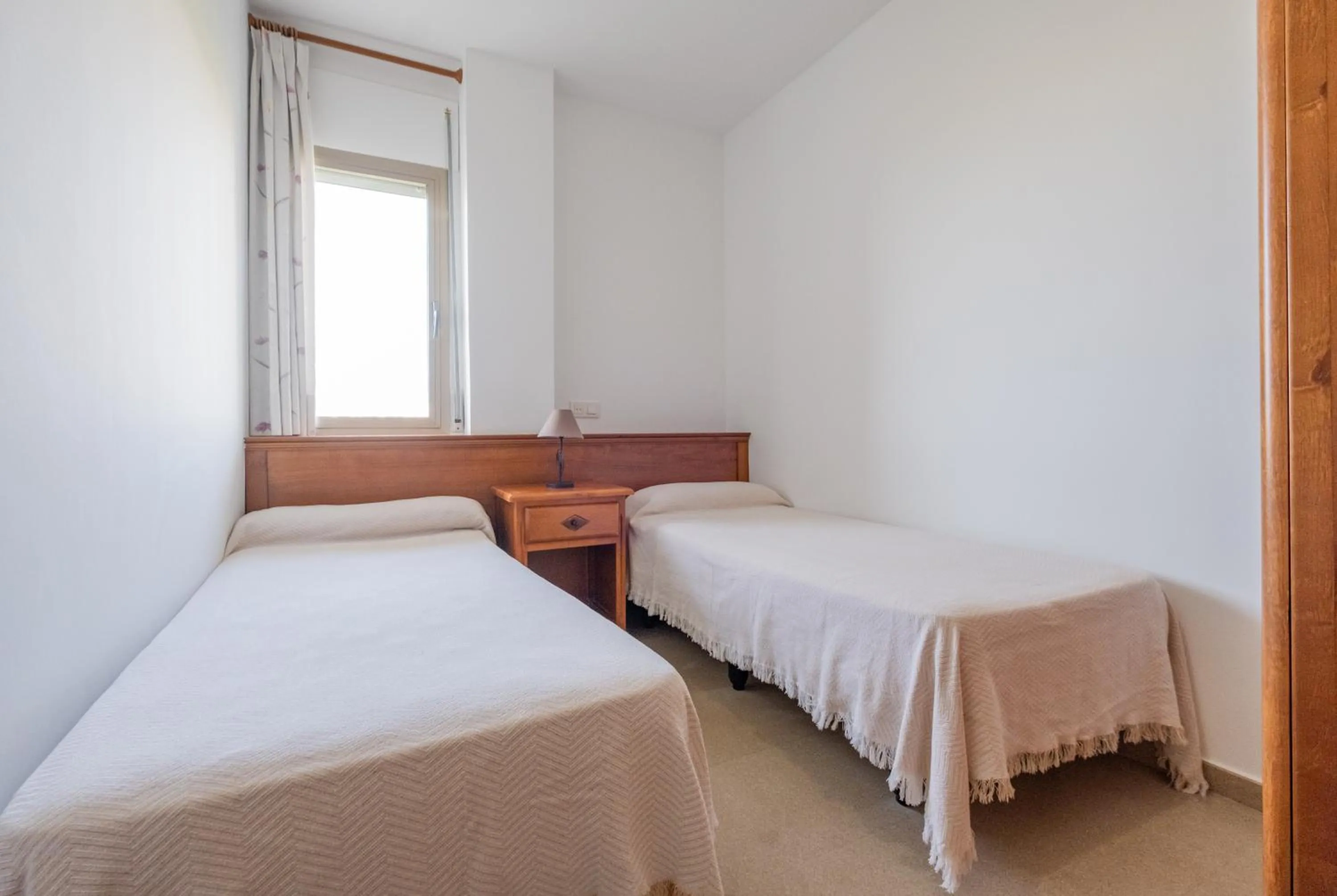 Bed in Apartamentos Proamar