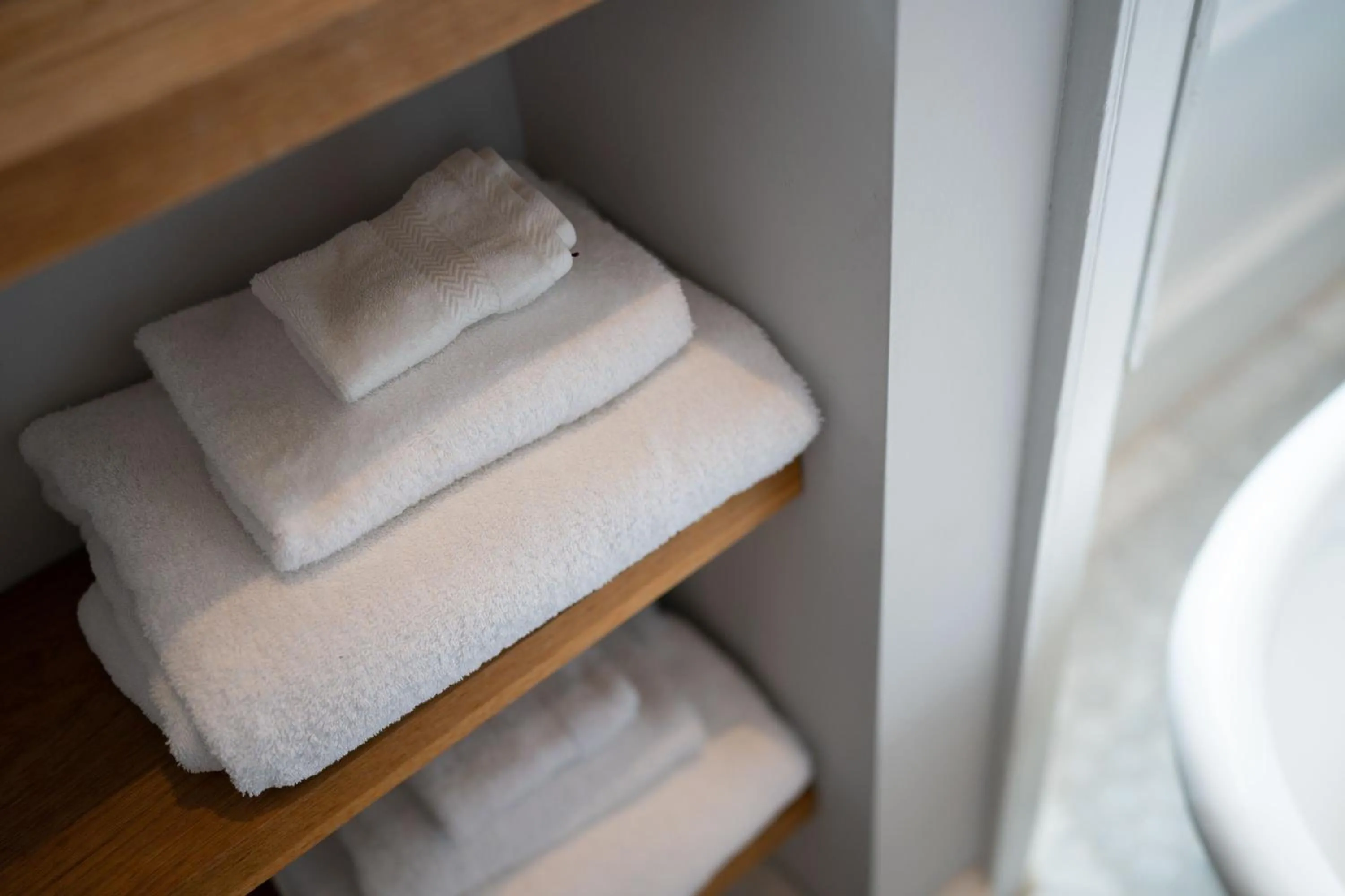 towels, Bed in No11 Boutique Hotel & Brasserie