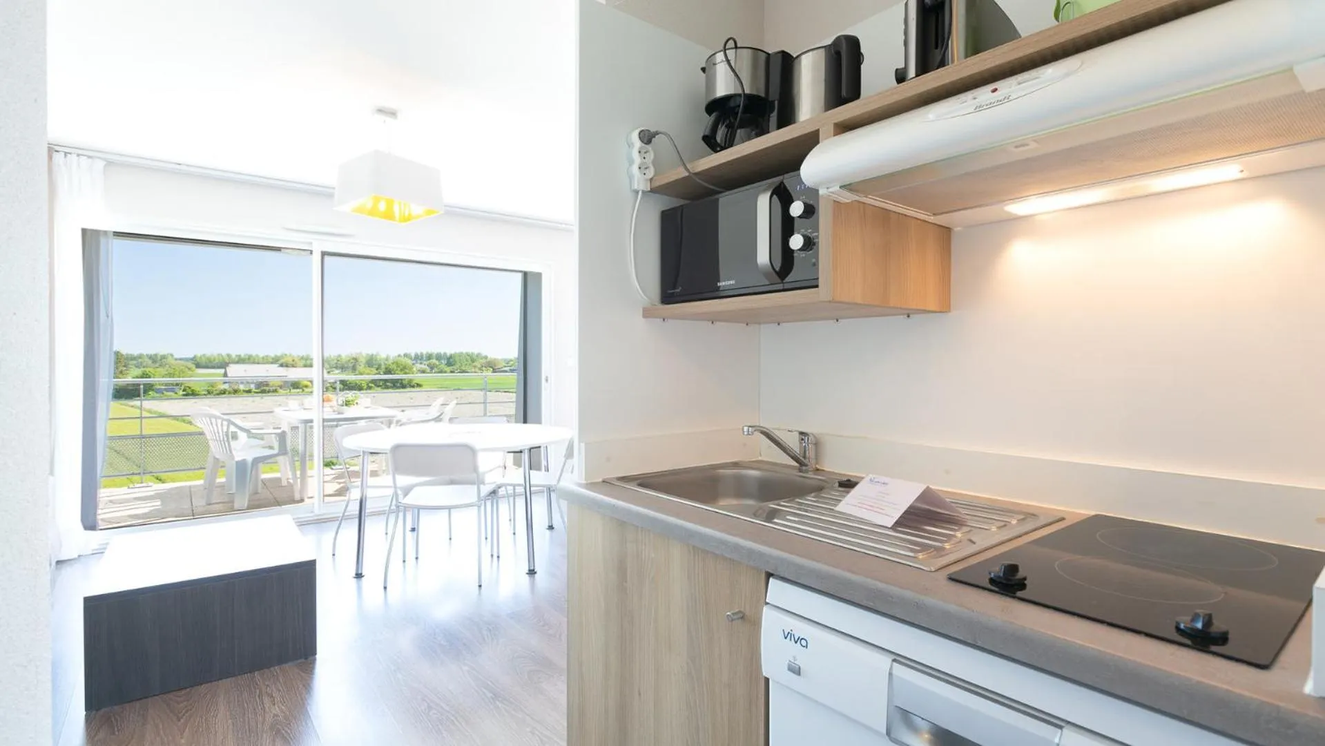 Kitchen or kitchenette in Vacancéole - Le Domaine du Mont - Mont St Michel